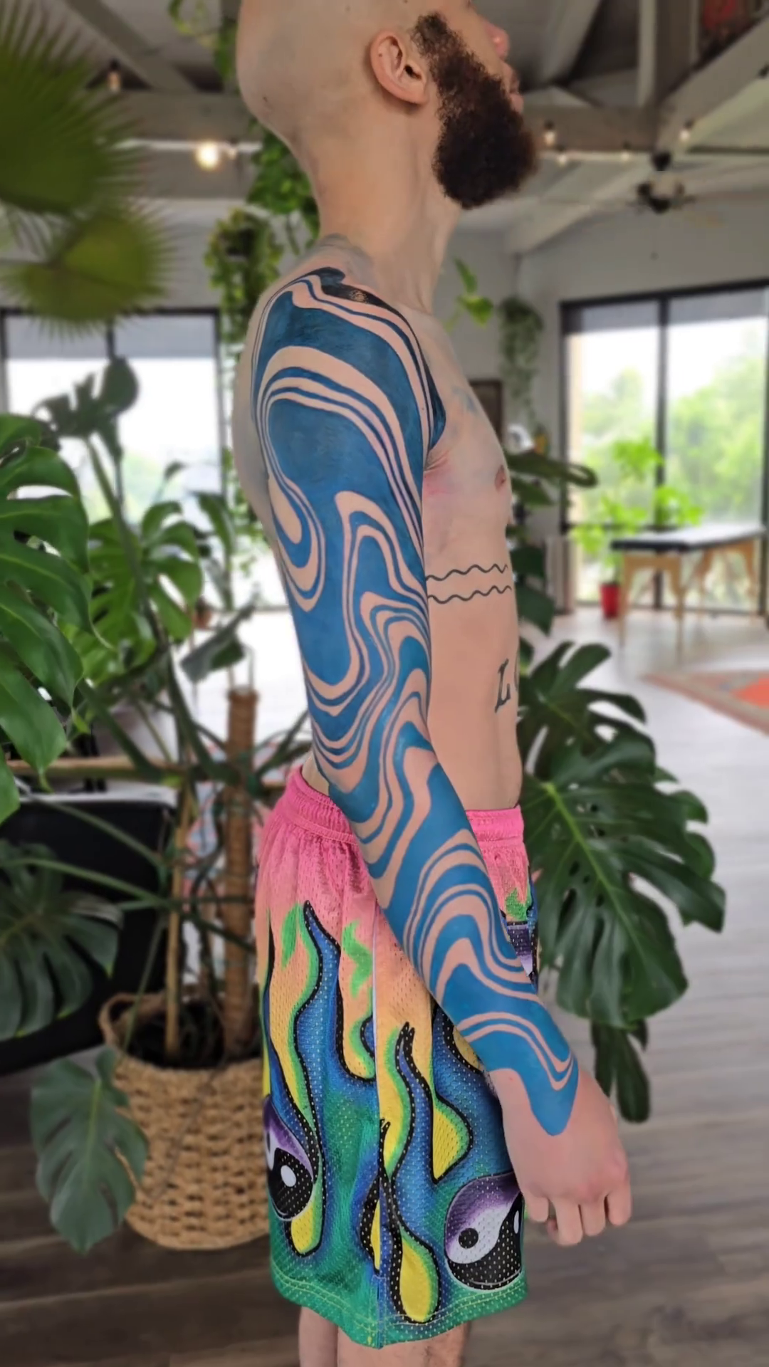 Flames and abstract shapes neo-traditional tattoo by Kevin Ligabue