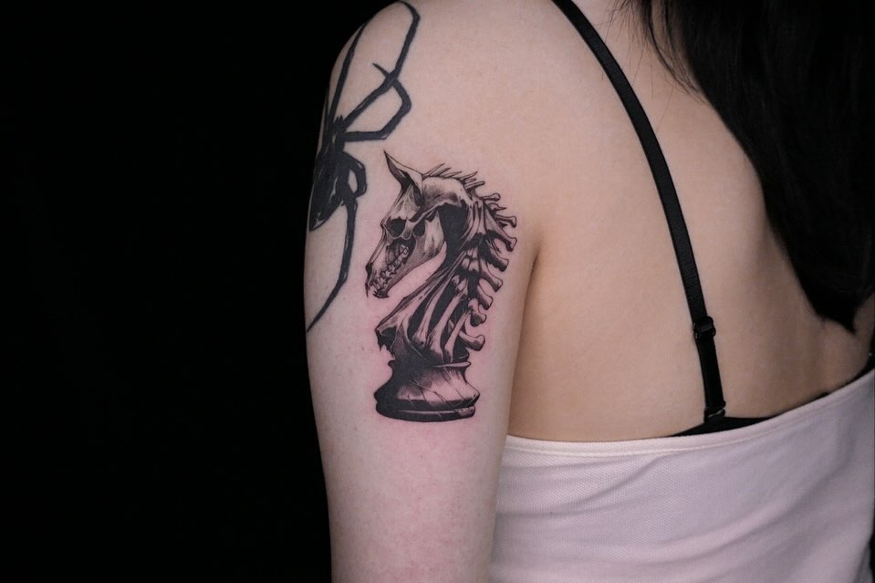 Horse head black and grey tattoo on the shoulder by 𝑴𝒆𝒍𝒐