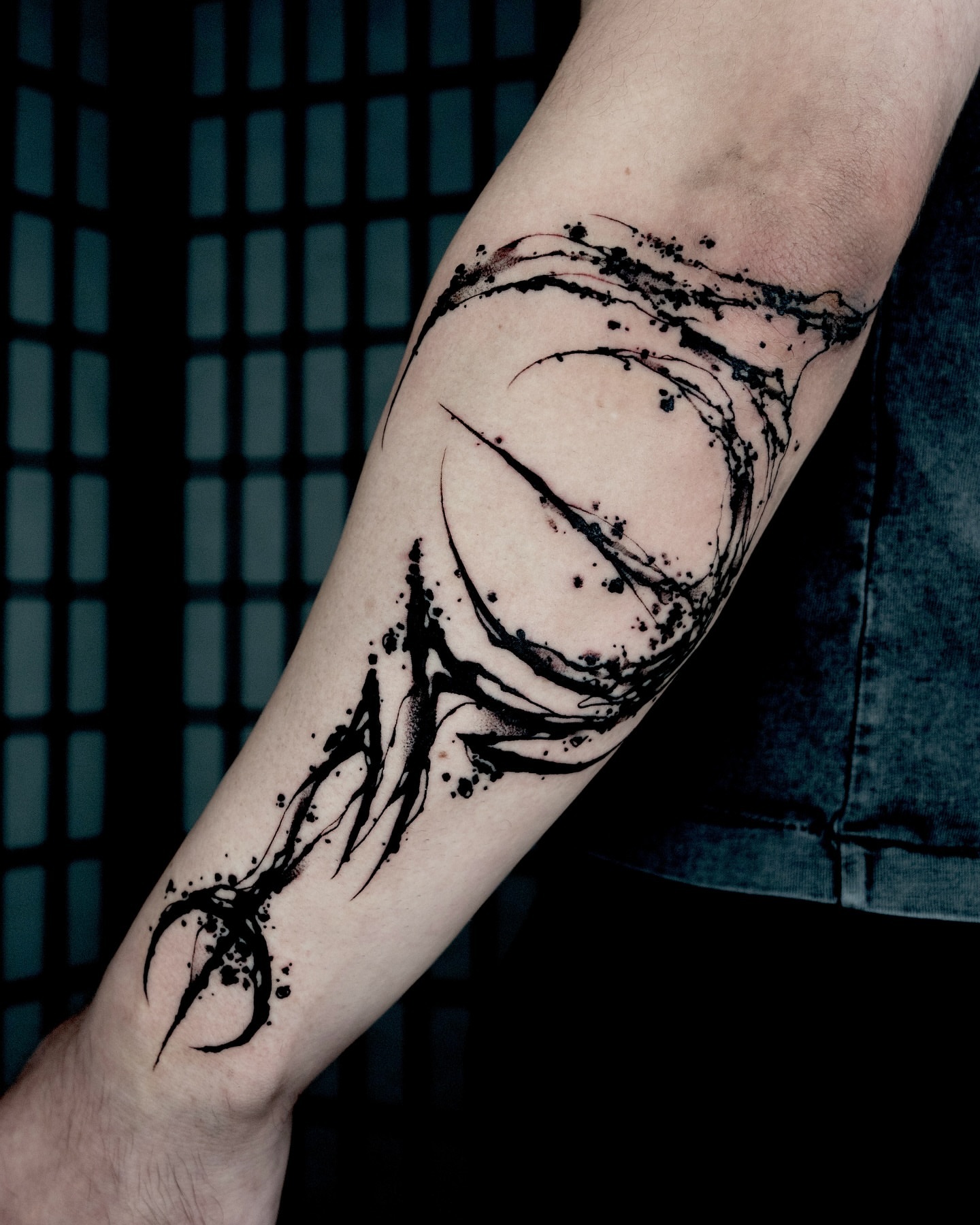 Abstract swirl dotwork tattoo on the forearm by Nathan
