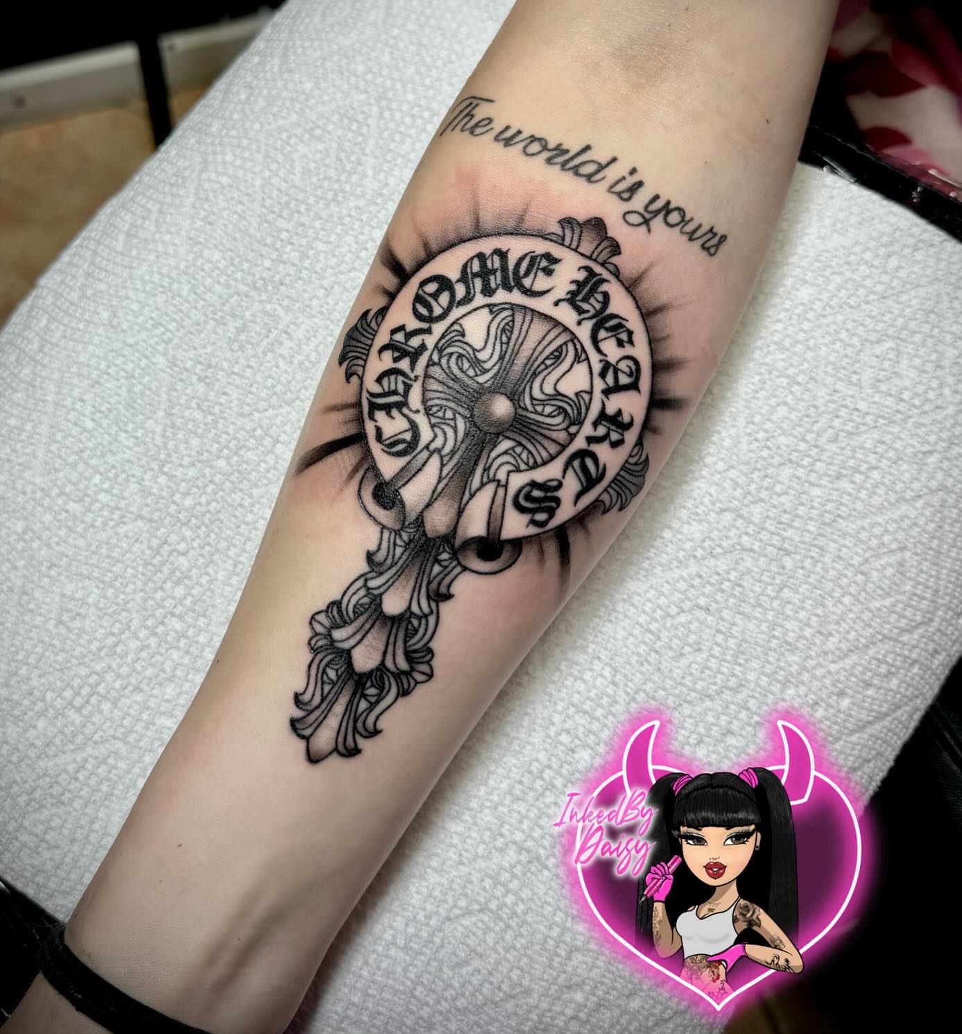 Key and wheel geometric tattoo on the forearm by Tattoo Artist based in Dallas Tx