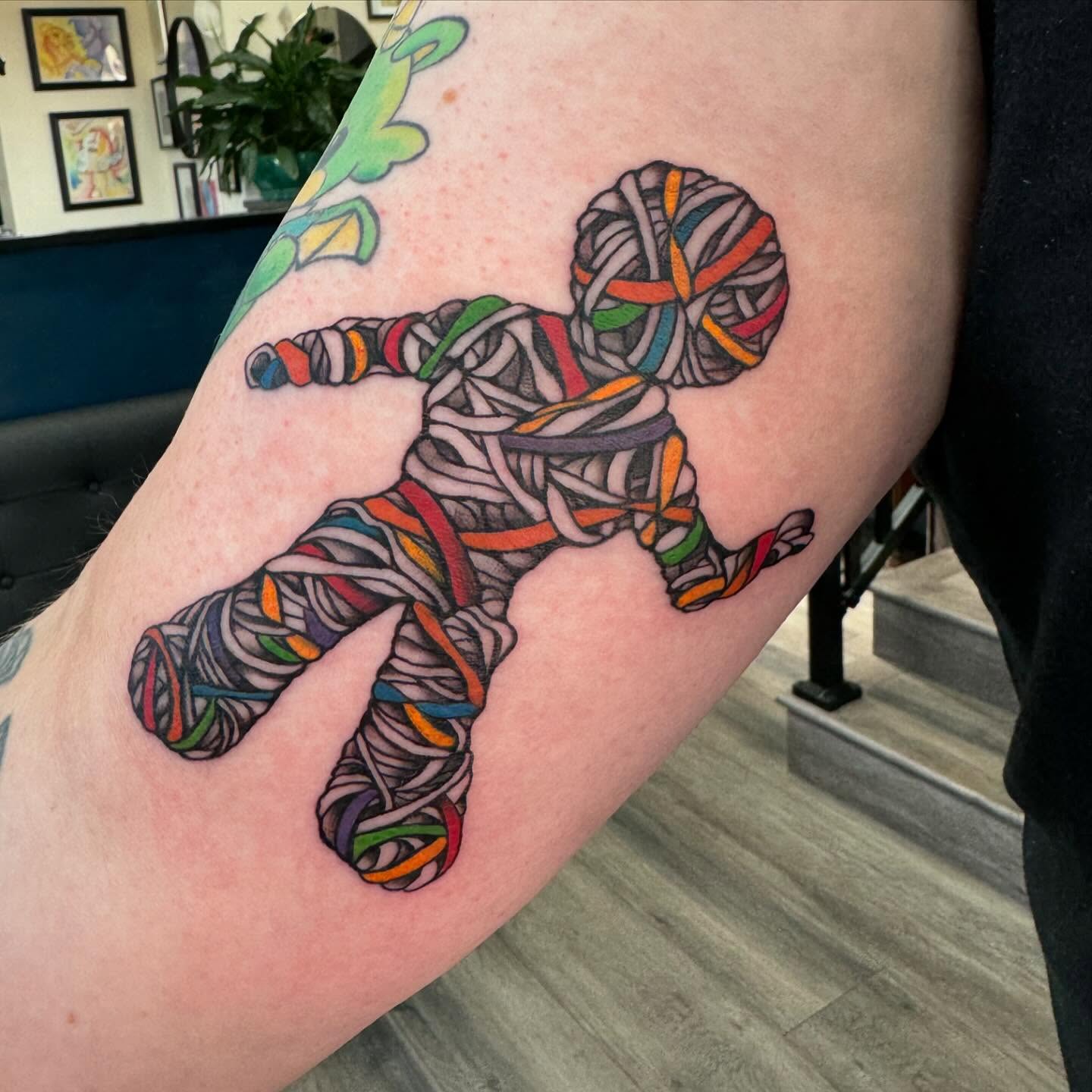 String figure dotwork tattoo on the forearm by Robyn Mahon