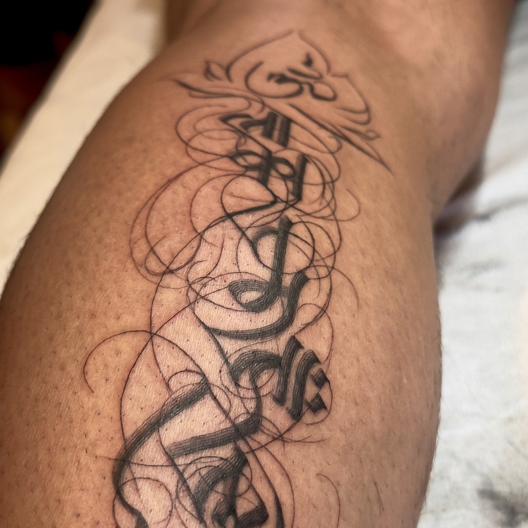 Script lettering lettering script tattoo on the thigh by Tattoo Artist Bay Area - Lorenzo, Berkeley, California