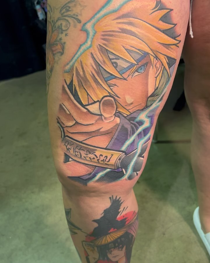 Anime character anime tattoo on the thigh by Bryon McVaney