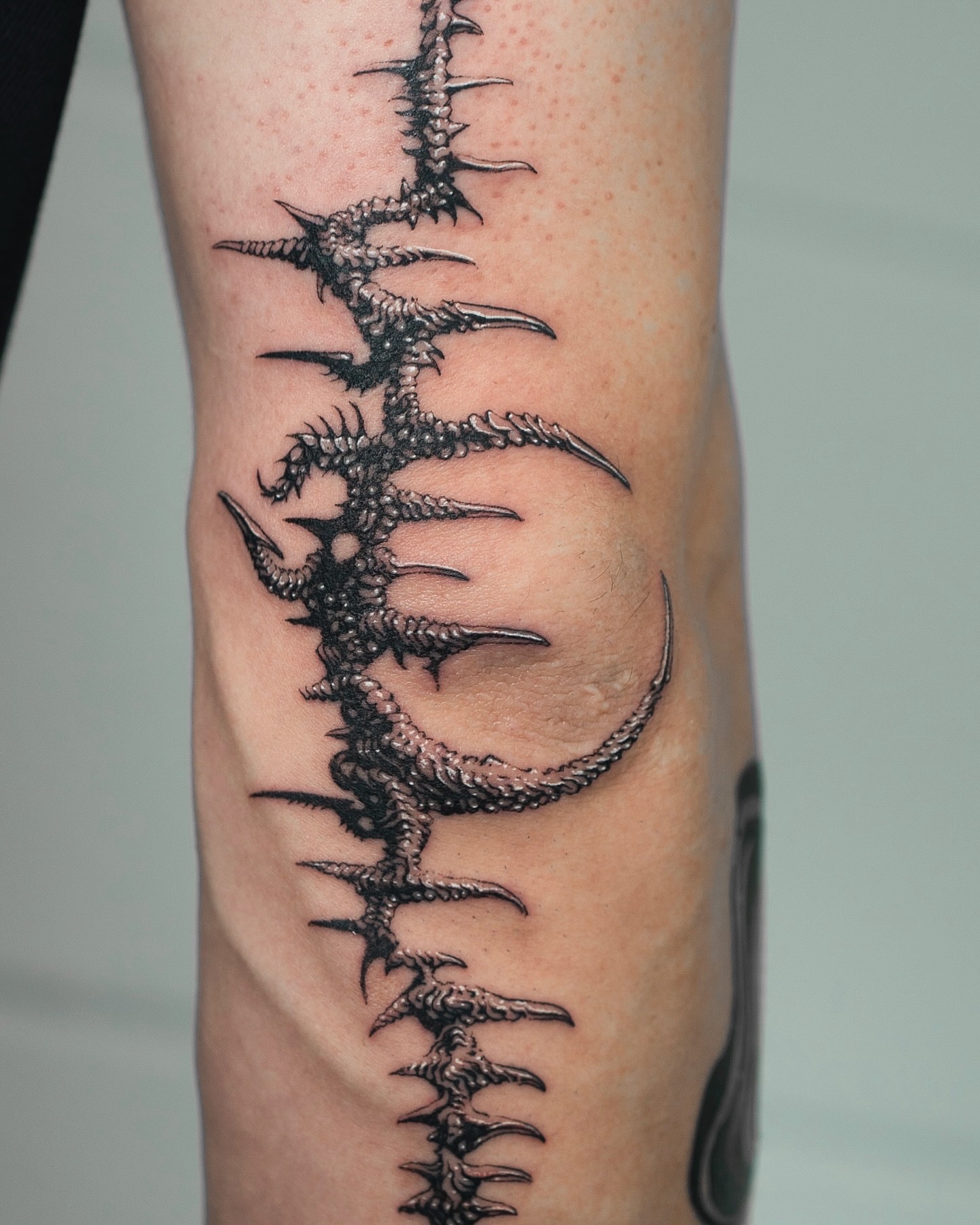 Tattoo by @nowthisyujhi — black_and_grey, geometric