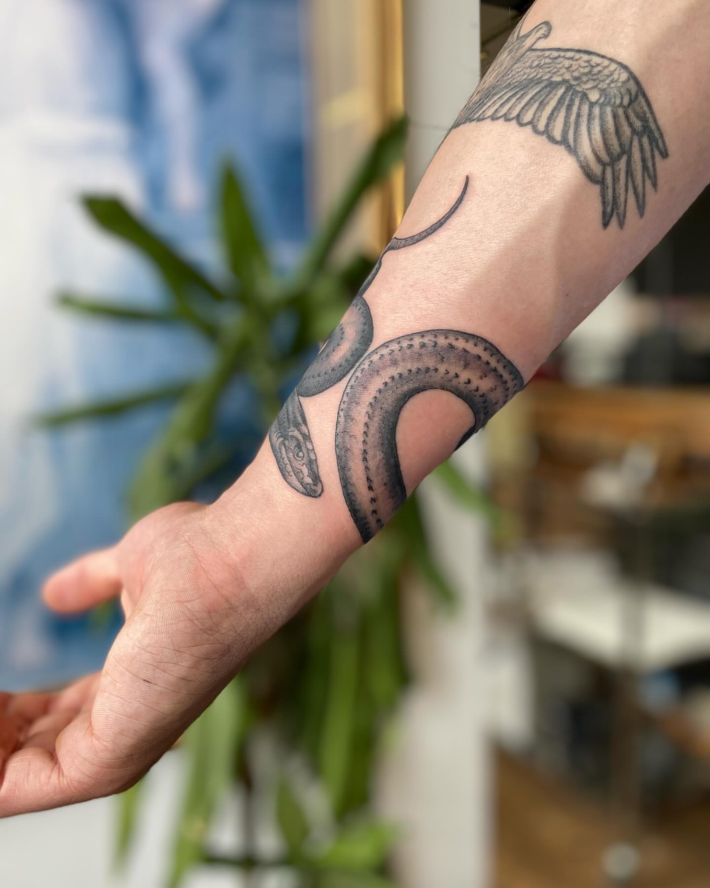 Tattoo by @chrisdafacetattoo — black_and_grey
