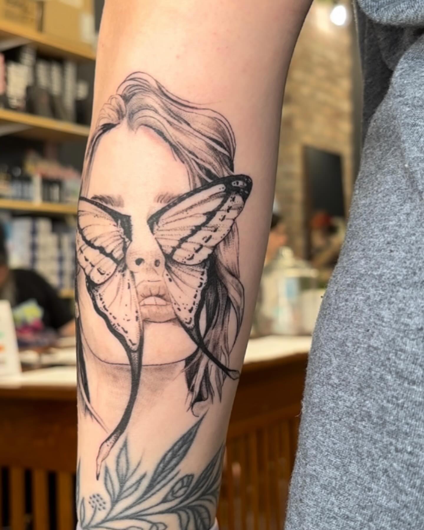 Woman with butterfly wings realism tattoo on the forearm by Harley Lane ๐ซ