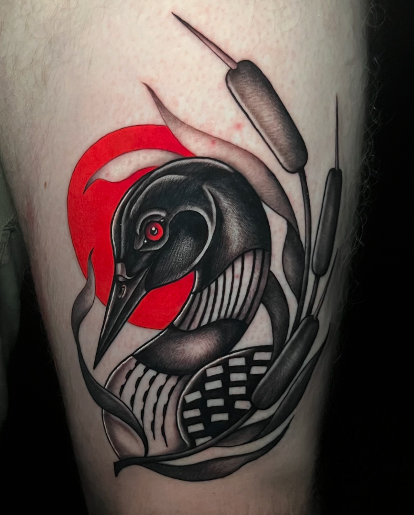 Loon American traditional tattoo on the thigh by Blu