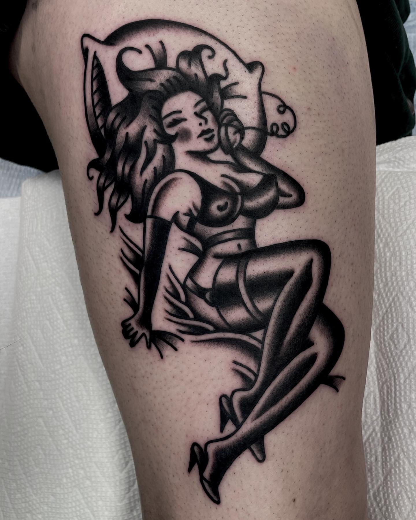 Pin-up girl American traditional tattoo on the thigh by Jenn ★ Reid
