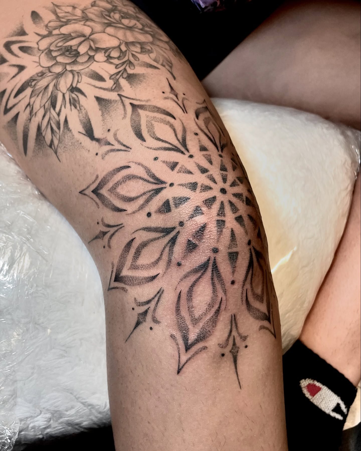 Geometric mandala dotwork tattoo on the forearm by Tattoo Artist