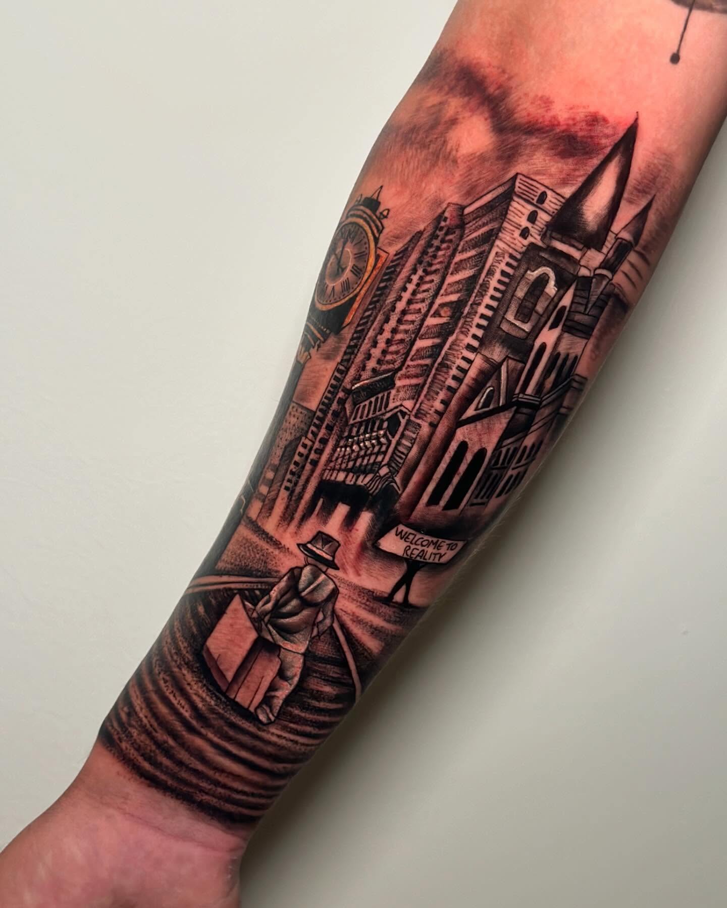 Cityscape with man realism tattoo on the forearm by Anghel Patricia