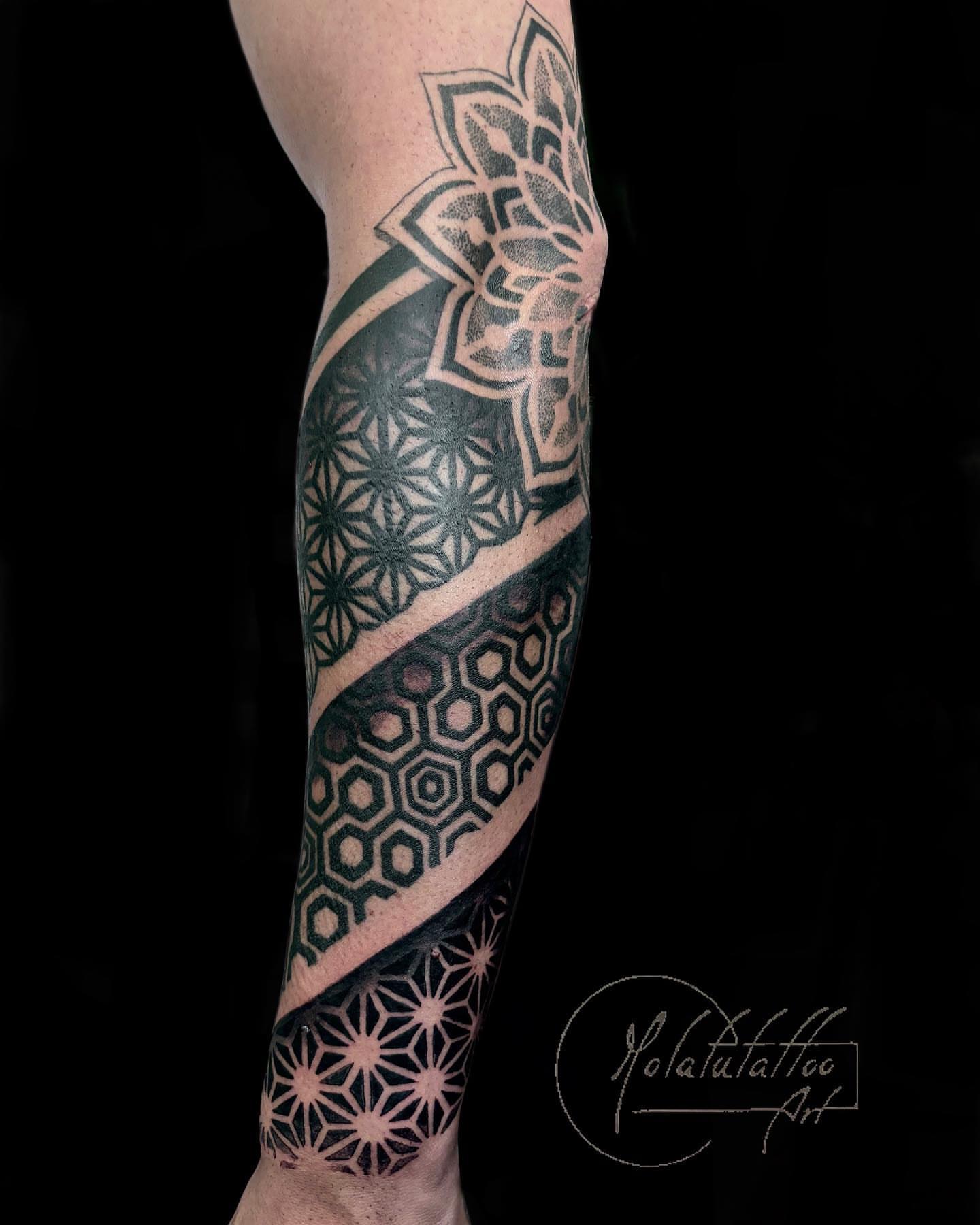 Geometric patterns geometric tattoo on the forearm by Molatutattoo