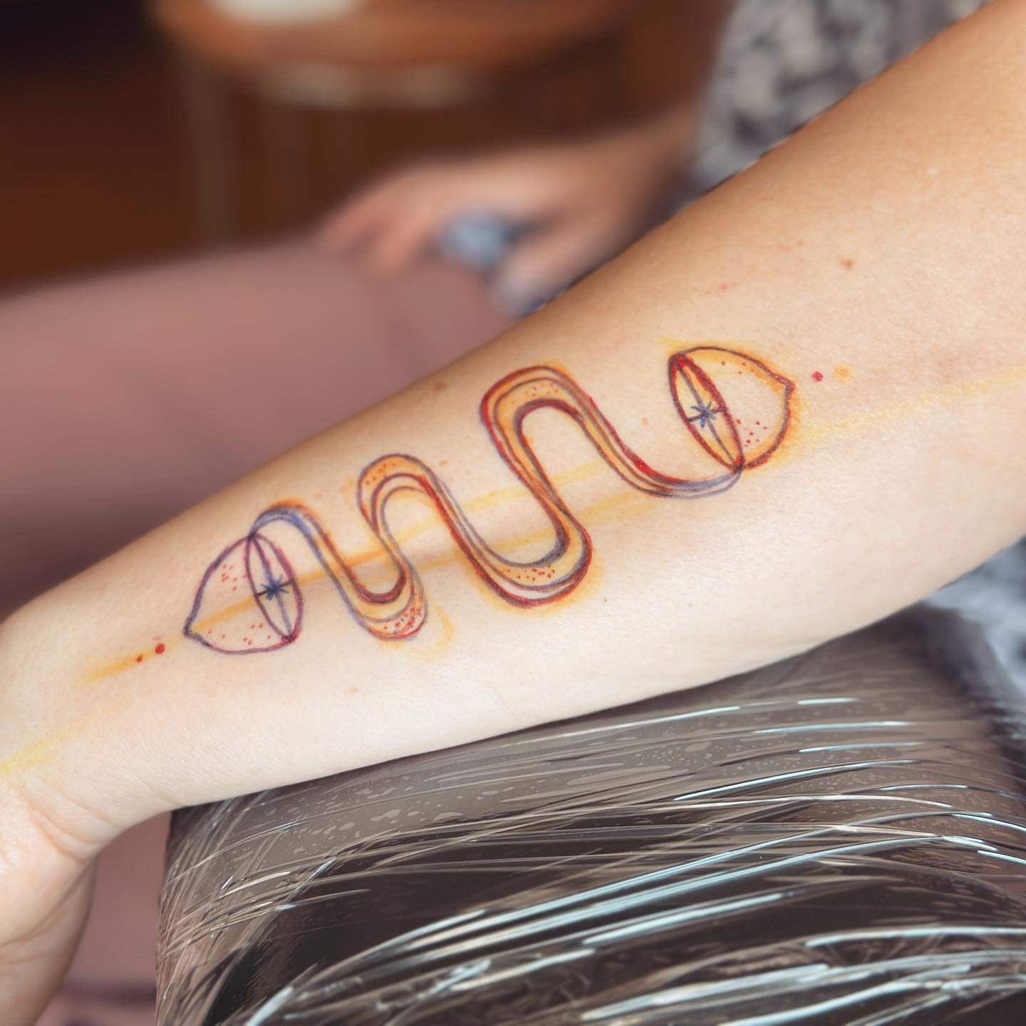 Abstract swirls dotwork tattoo on the forearm by Gaya