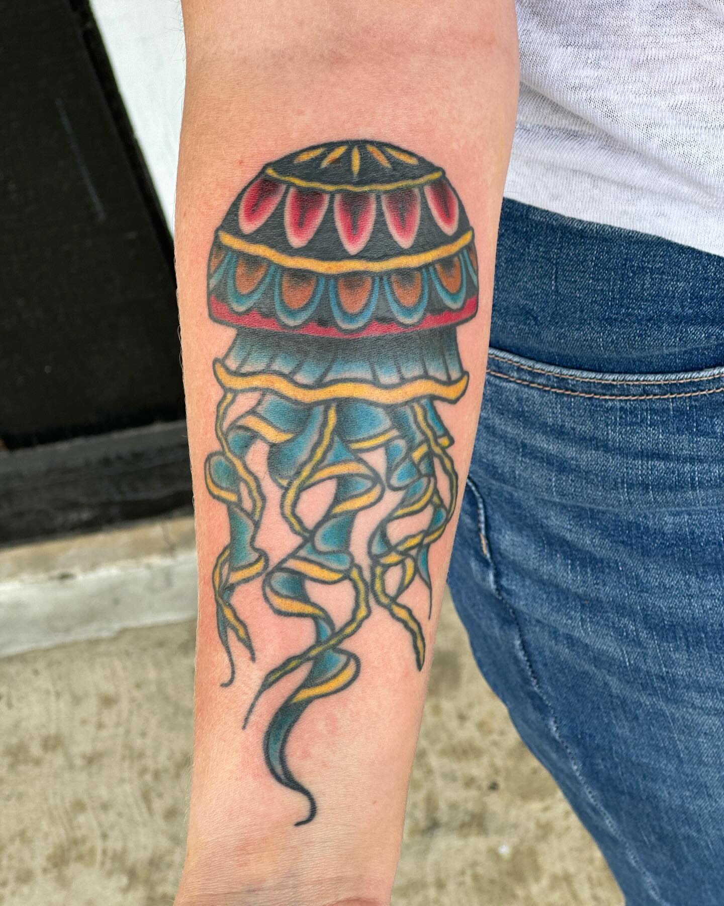 Jellyfish new school tattoo on the forearm by Zach Eden