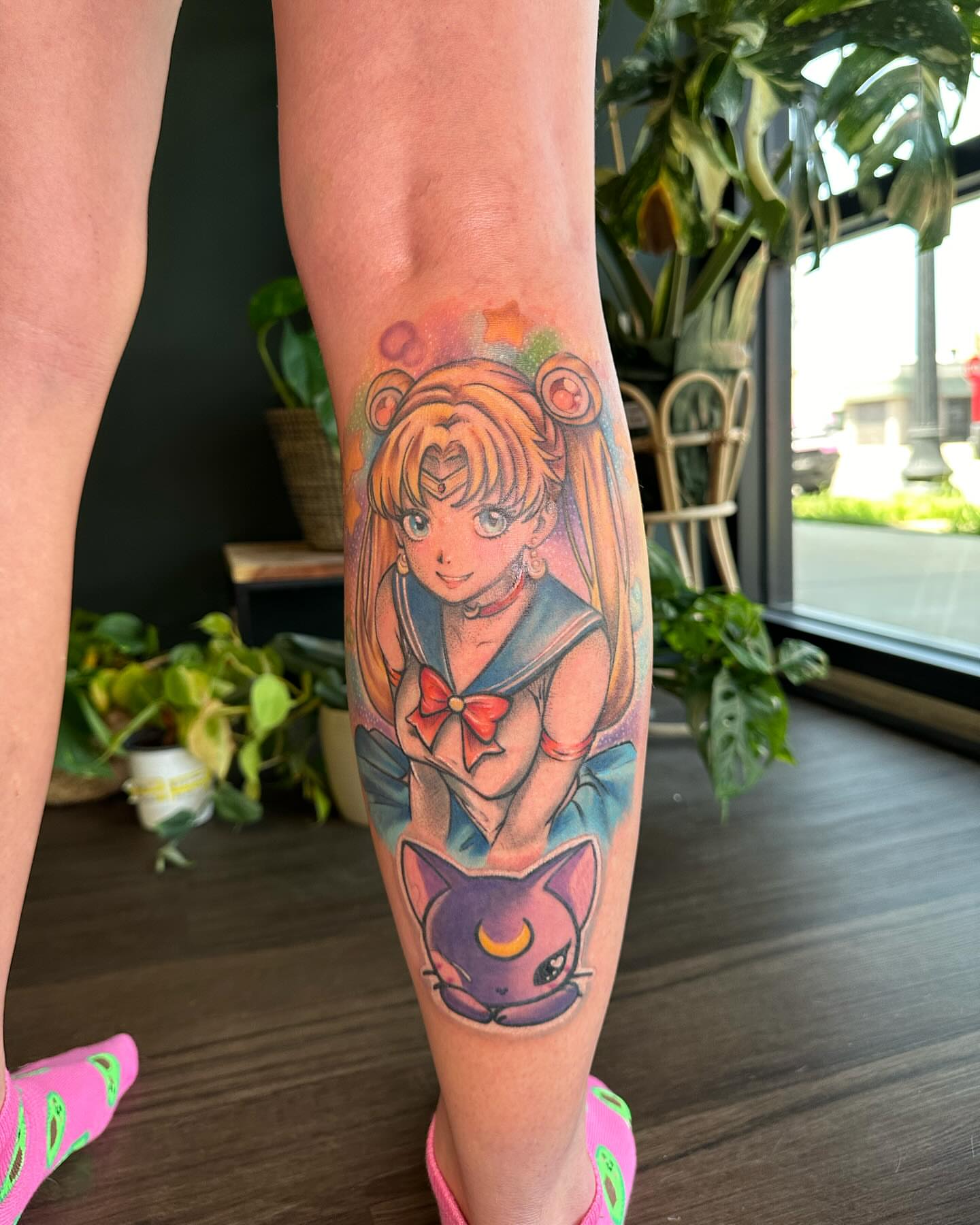 Sailor moon and cat anime tattoo on the forearm by Valen Laska