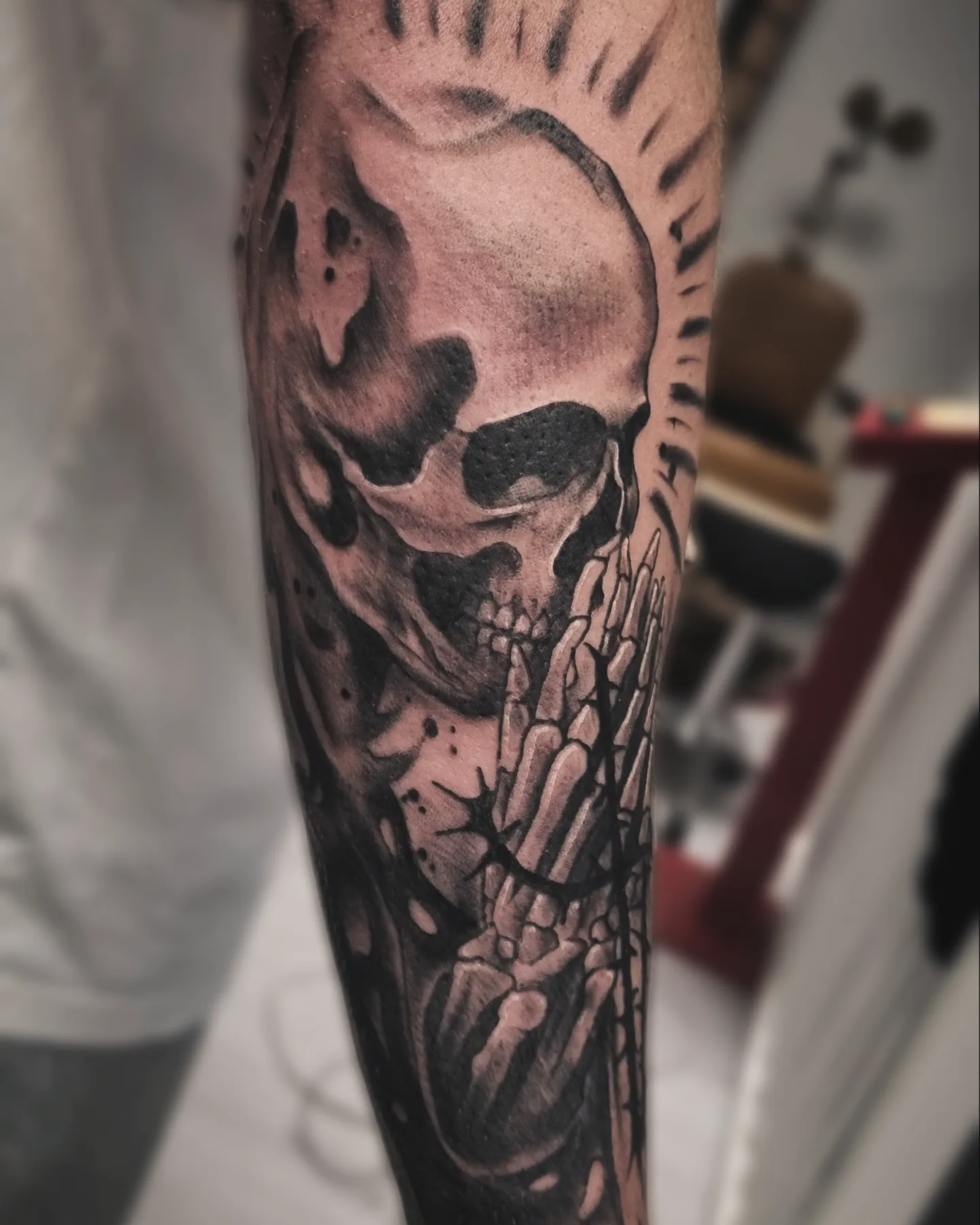 Skull realism tattoo on the forearm by AntiheroTattoo