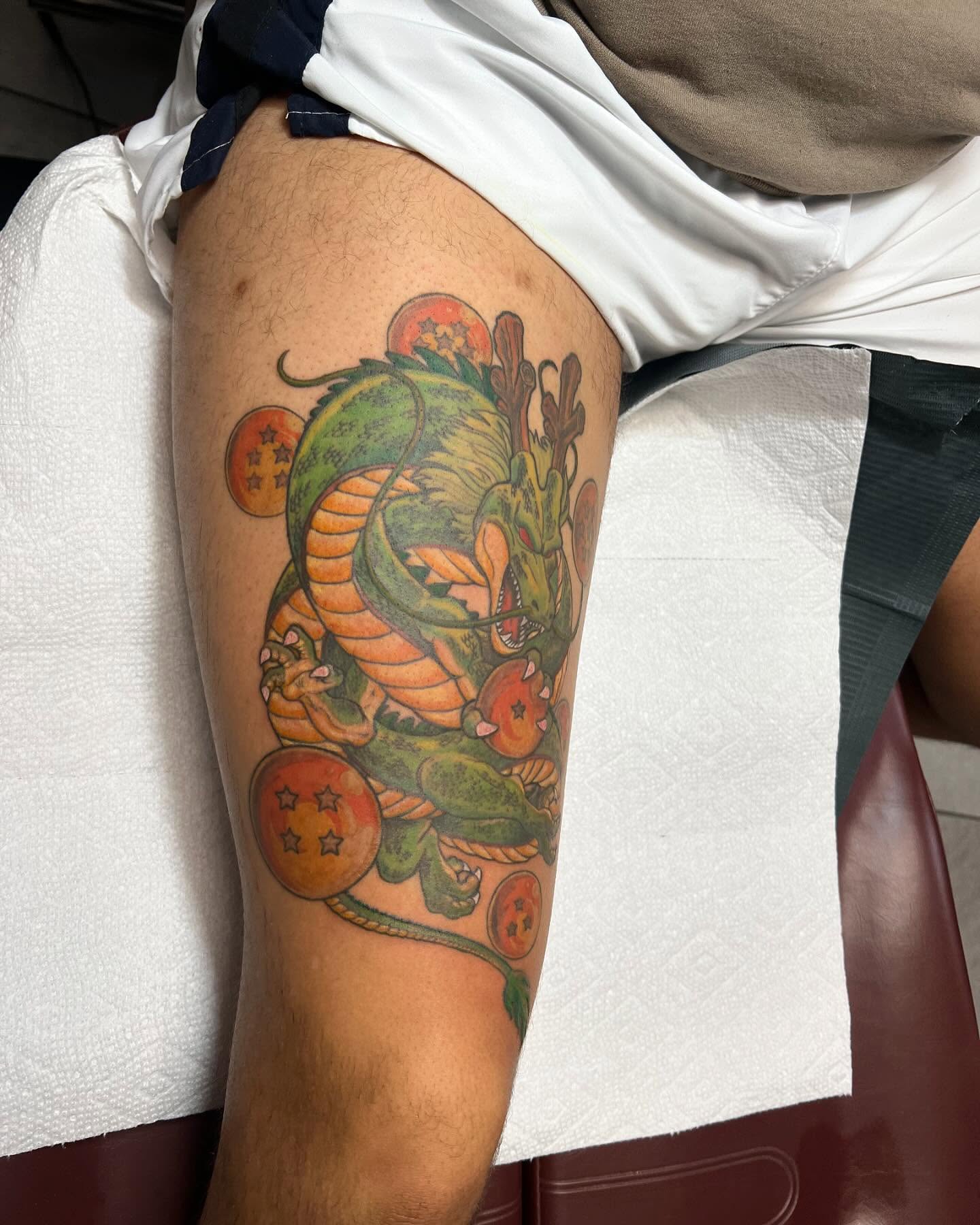 Dragon and orbs dotwork tattoo on the thigh by Vincent C DiBiaso, Covington, Kentucky