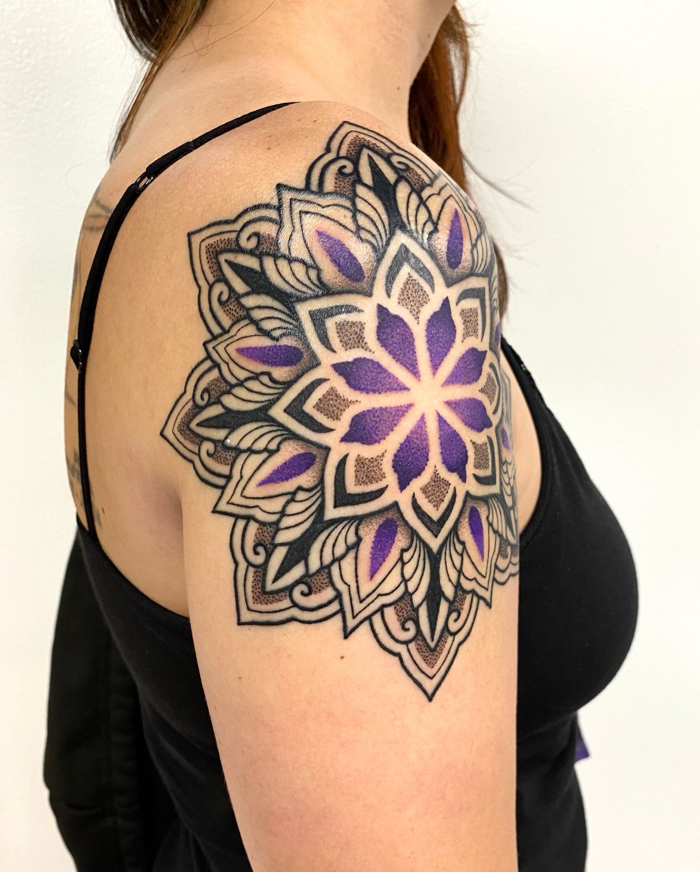 Mandala dotwork tattoo on the shoulder by Rose Ulinski