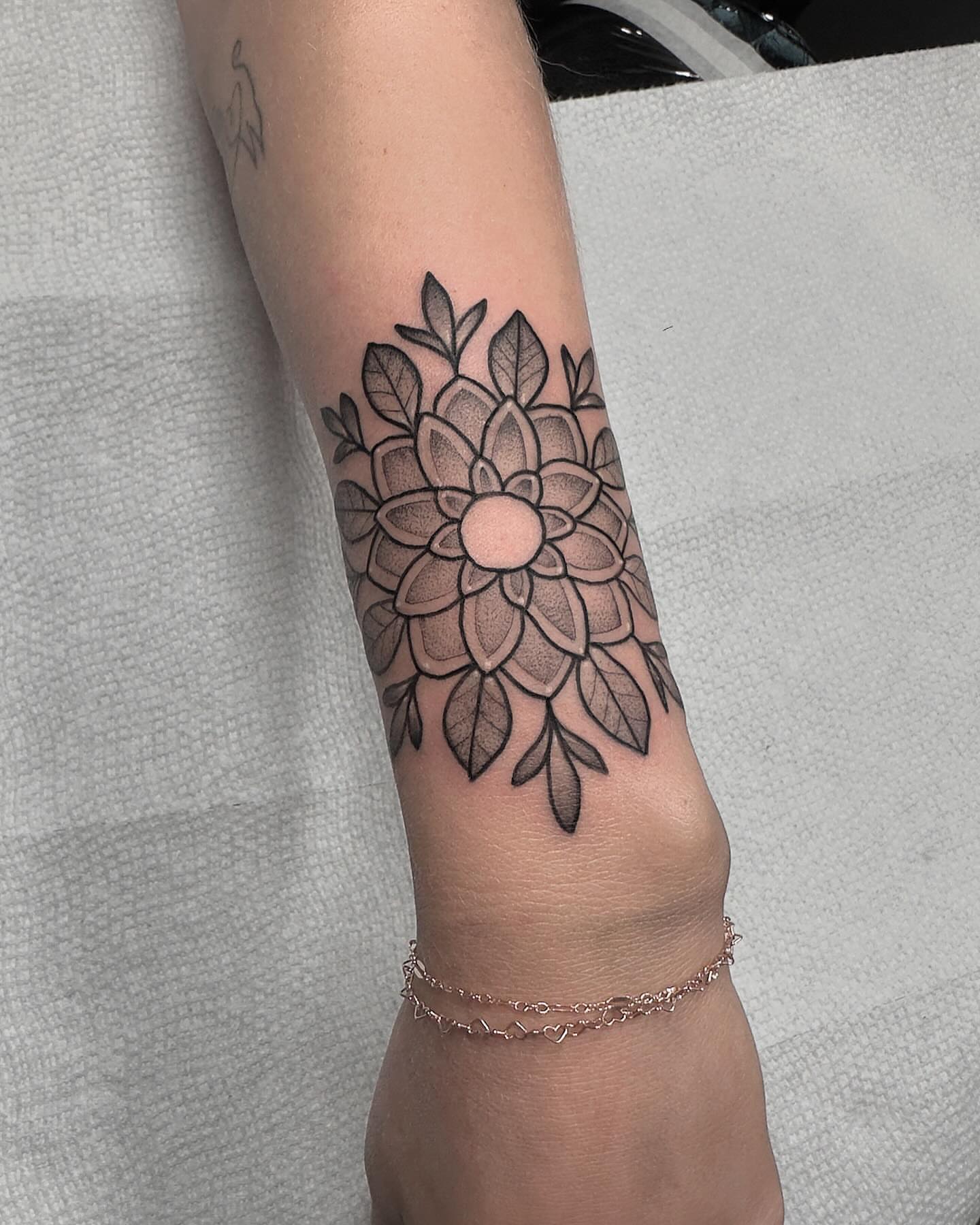Tattoo by @feraleyes — dotwork