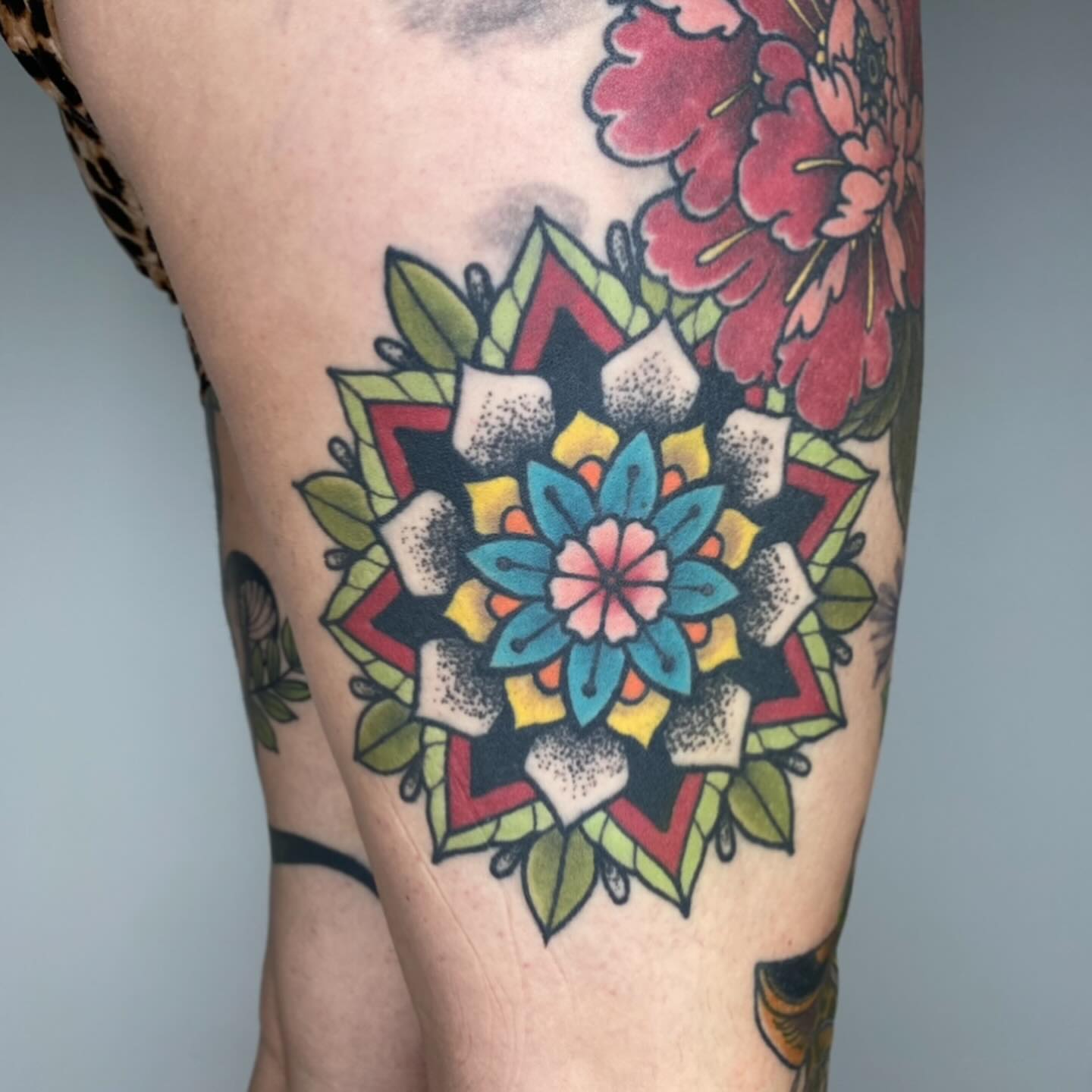 Mandala American traditional tattoo on the thigh by Amber Lea, Kansas City, Kansas