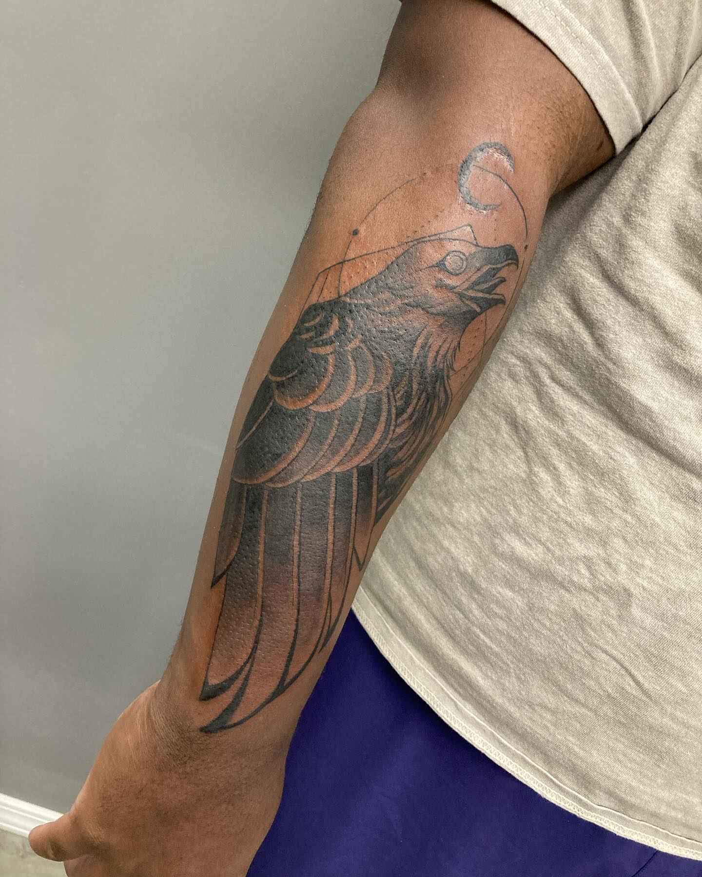 Eagle black and grey tattoo on the forearm by Detroit Tattoo Artist