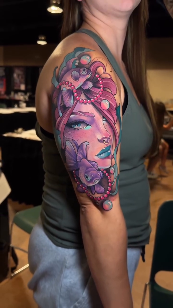 Woman with flowers and fish neo-traditional tattoo by Evin Pfaff, Bedford, Pennsylvania