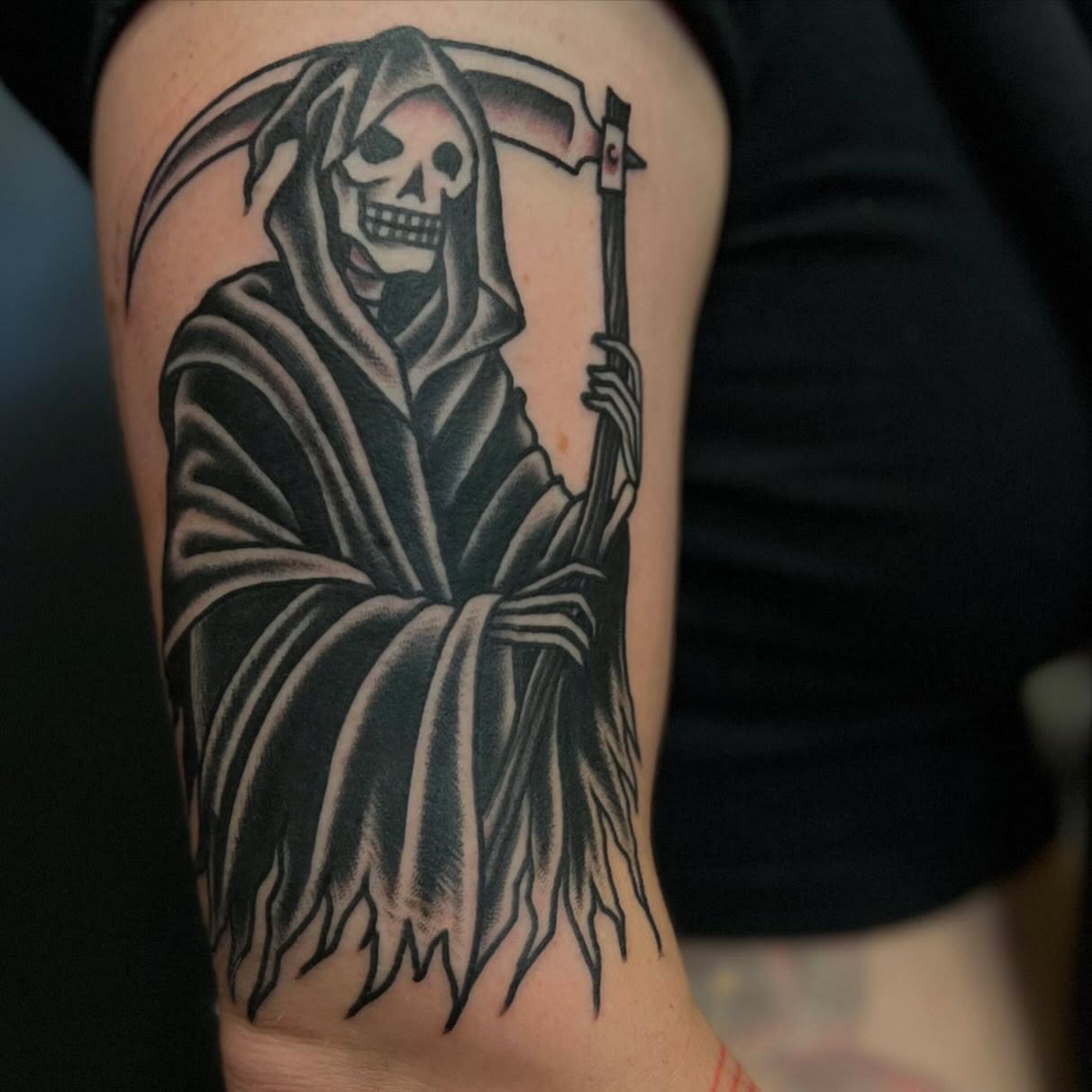 Grim reaper black and grey tattoo on the forearm by Ross K. Jones Tattoos, San Francisco, California