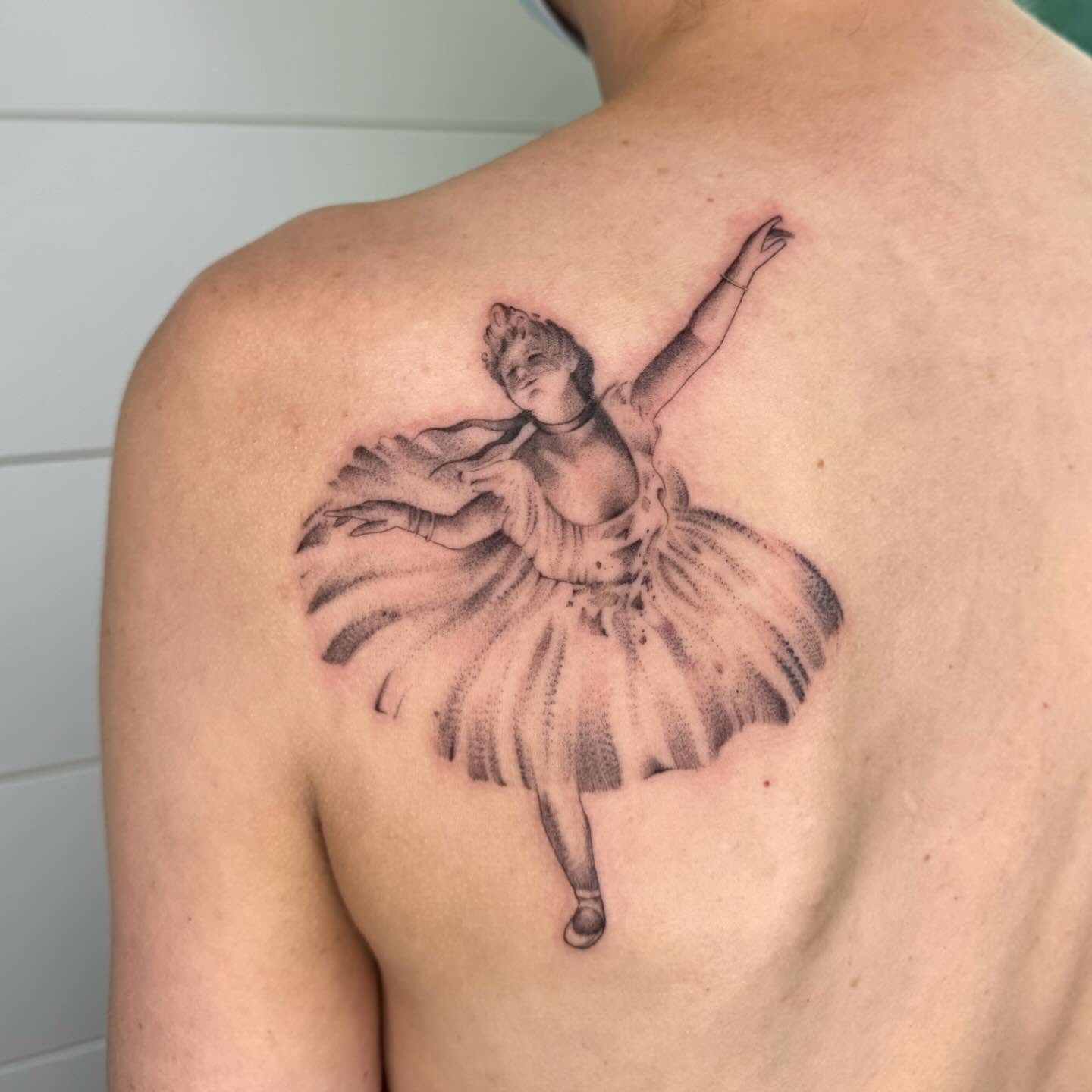 Ballerina black and grey tattoo on the back by Alyssa . Villela