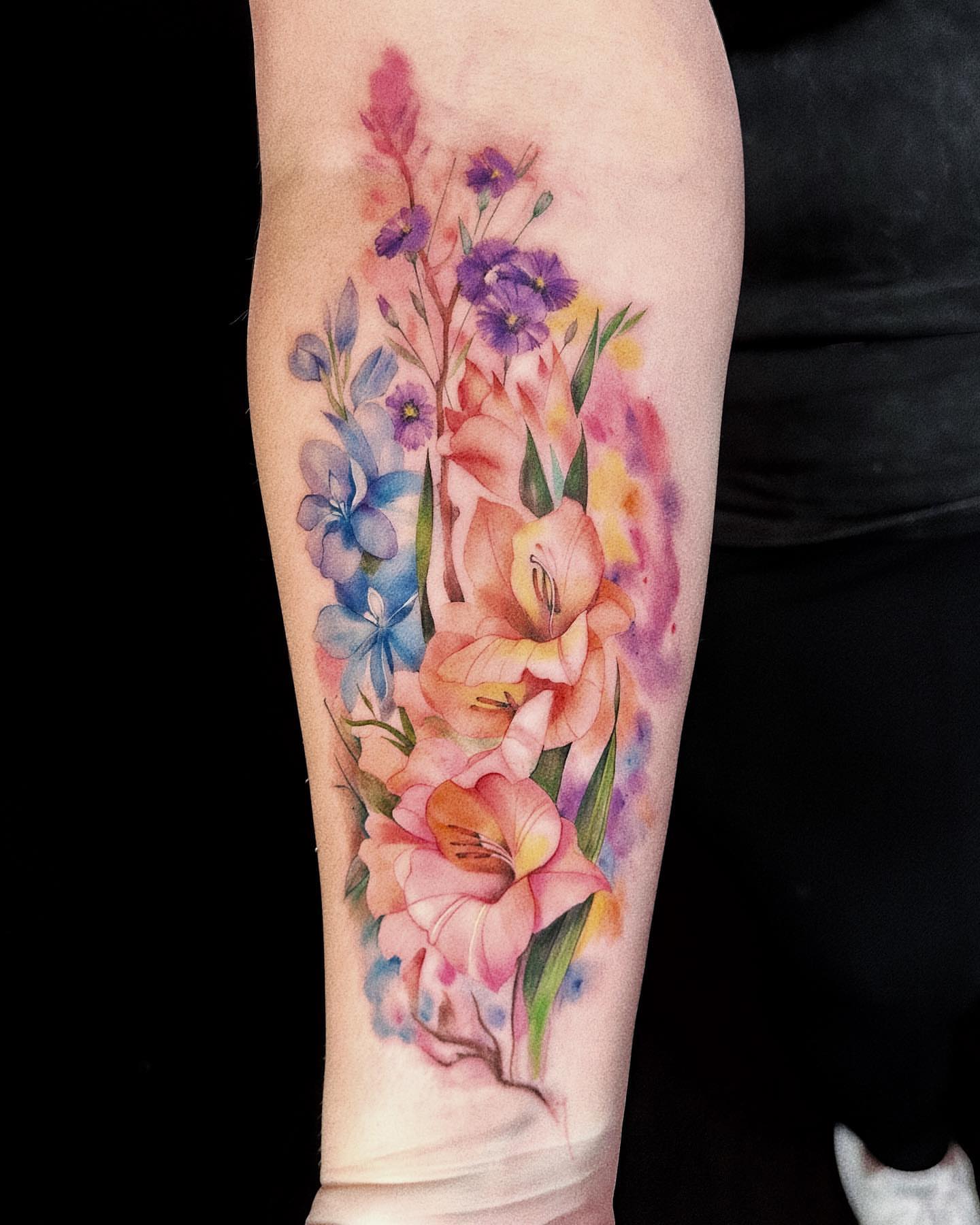 Tattoo by @assassintattooalice — watercolor