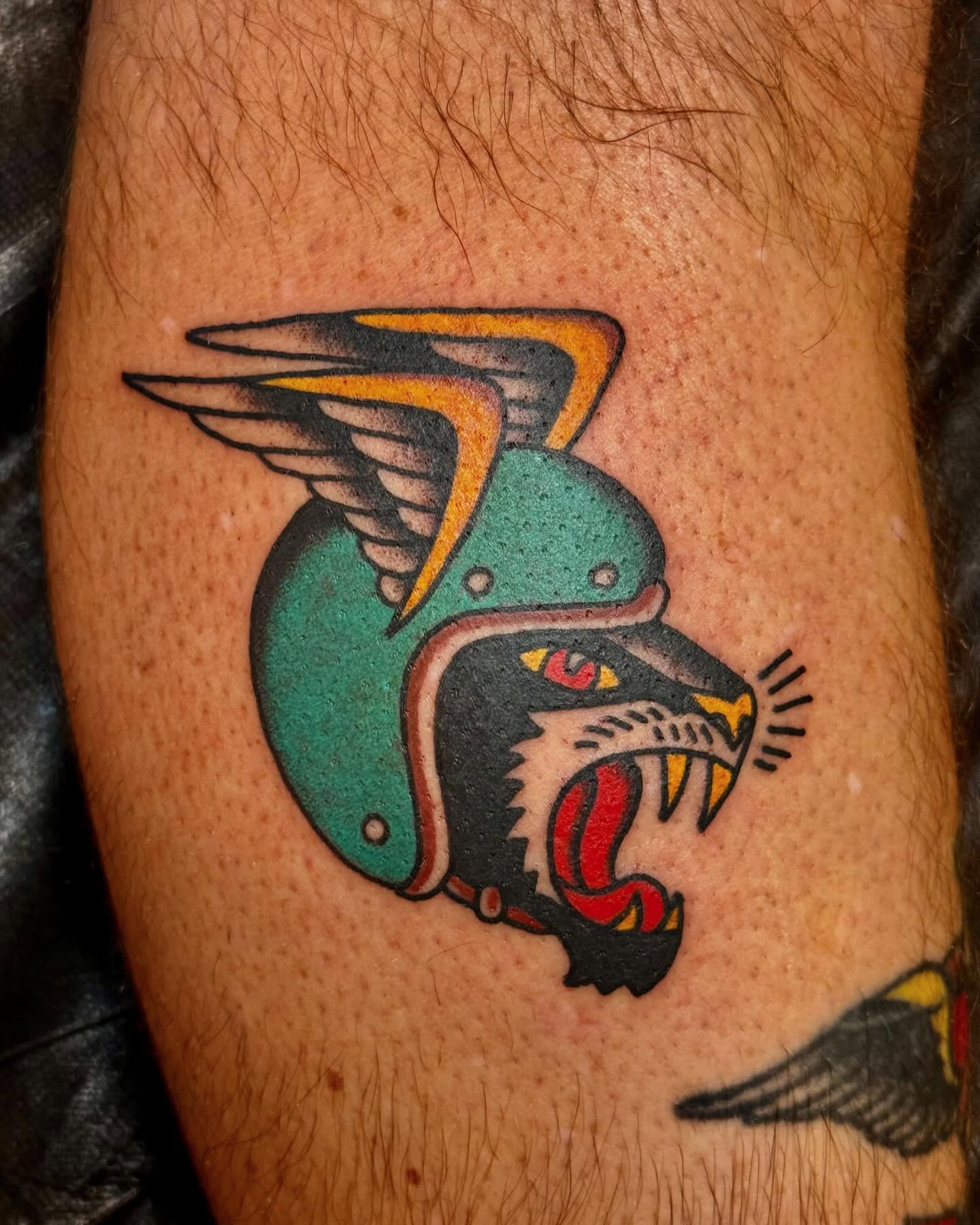 Bird helmet American traditional tattoo on the forearm by Nick Rodin
