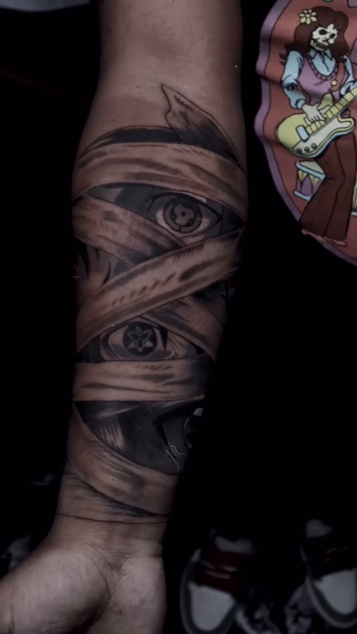 Mummy bandages and eyes realism tattoo by Pigmentpirate