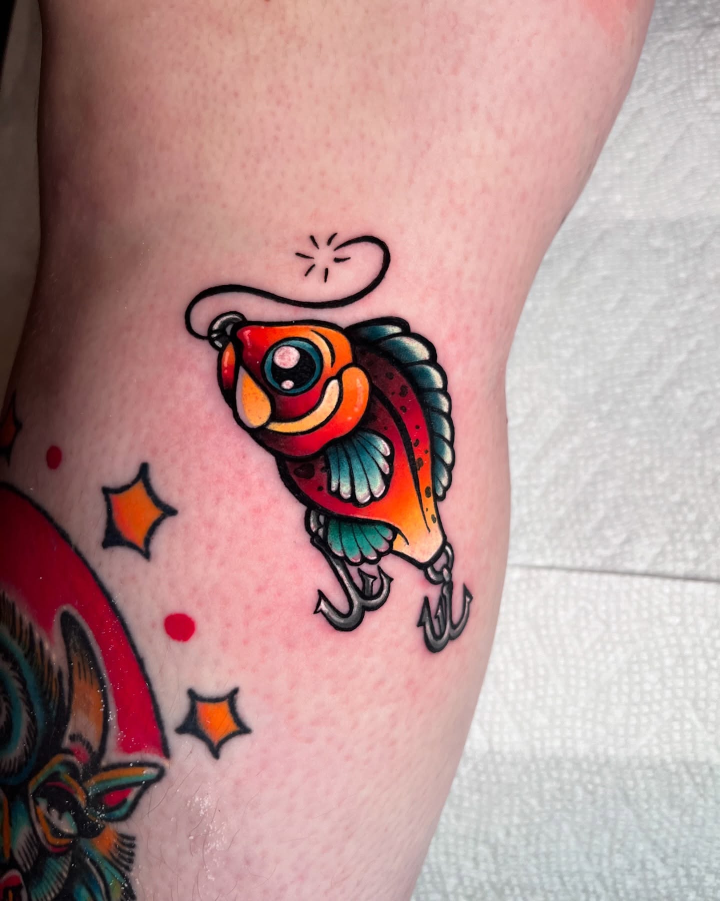 Fish American traditional tattoo on the forearm by ʙᴇᴄᴄᴀ ʟʏɴɴ