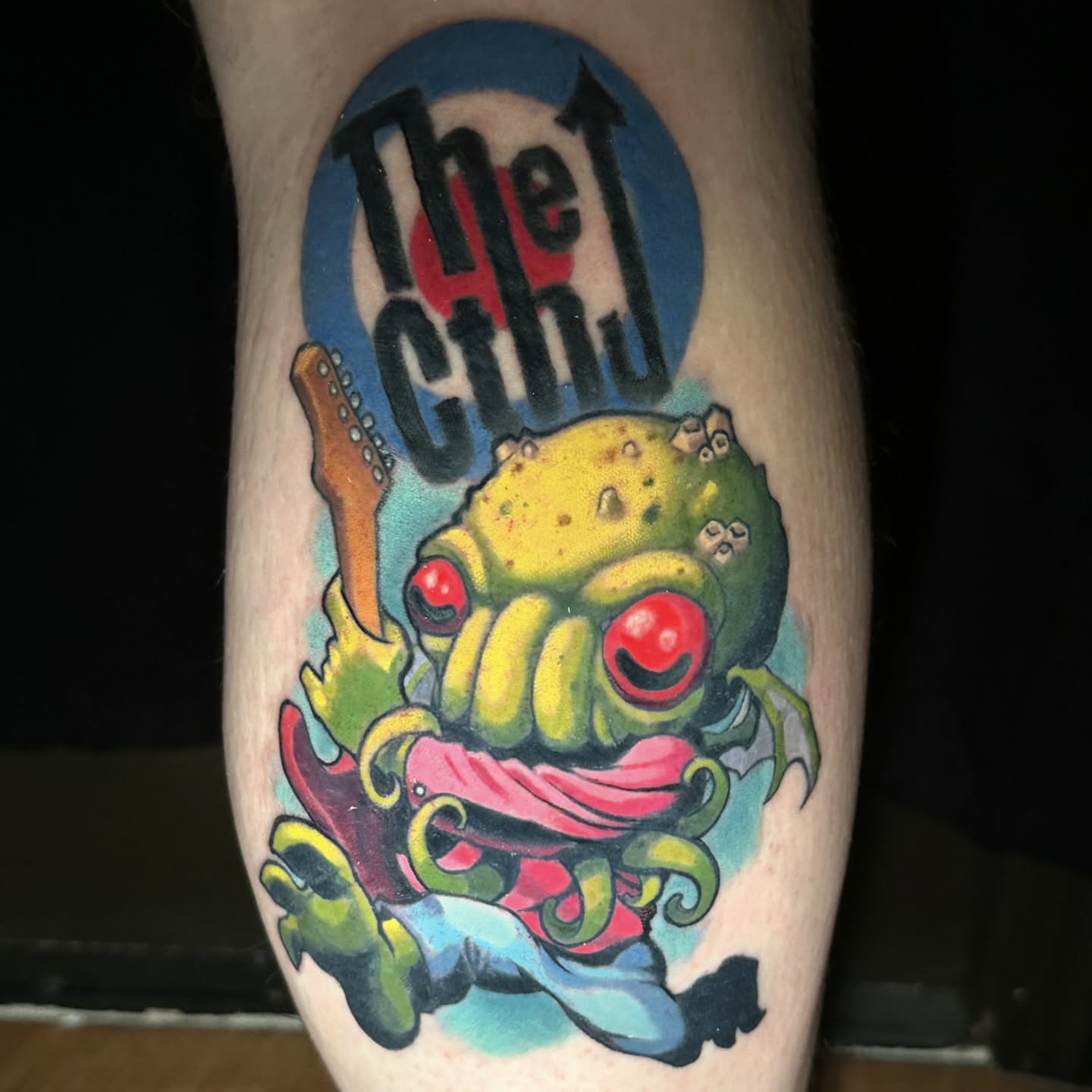 Alien creature new school tattoo on the forearm by shane baker