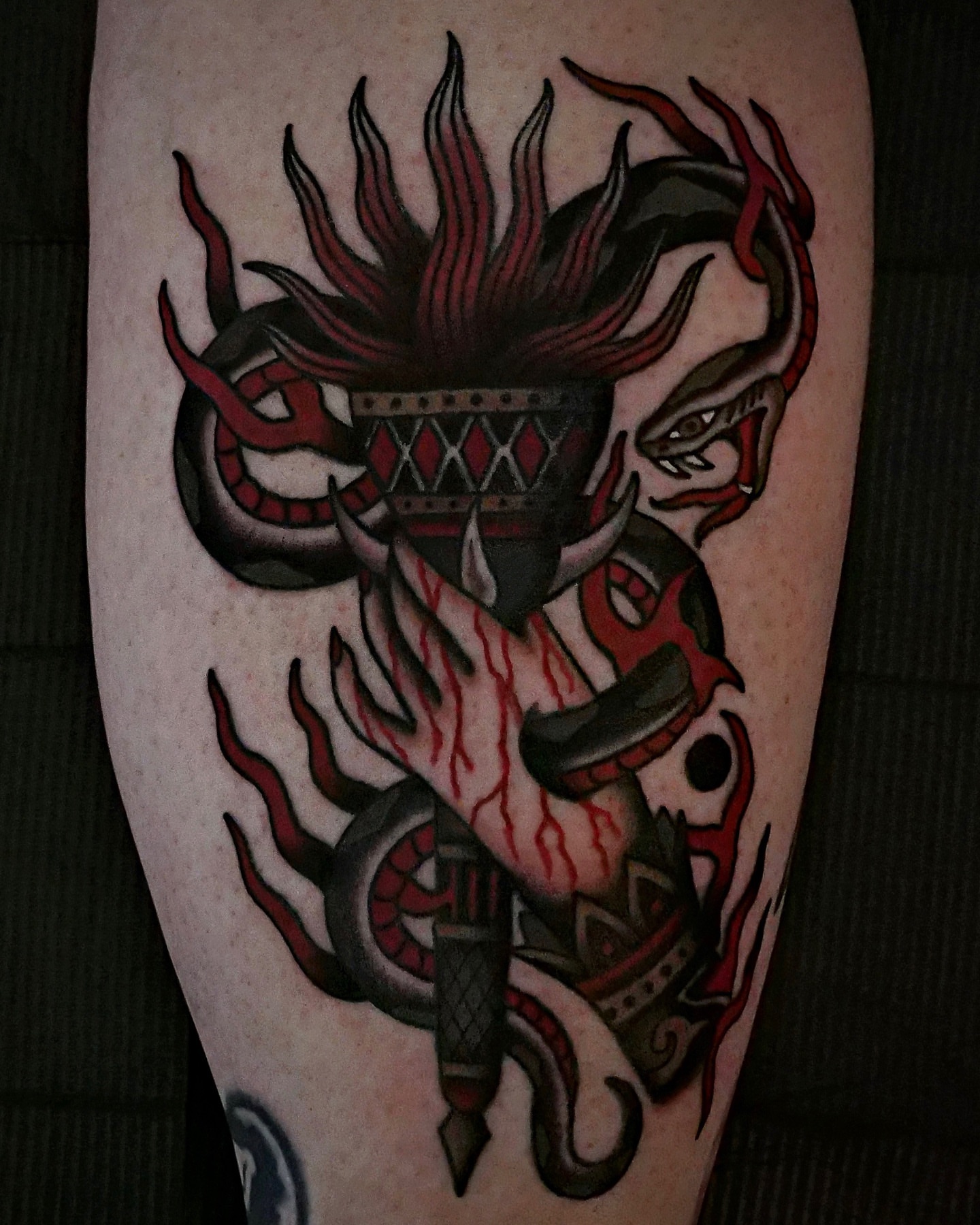 Dragon American traditional tattoo on the forearm by Brandon Murphy