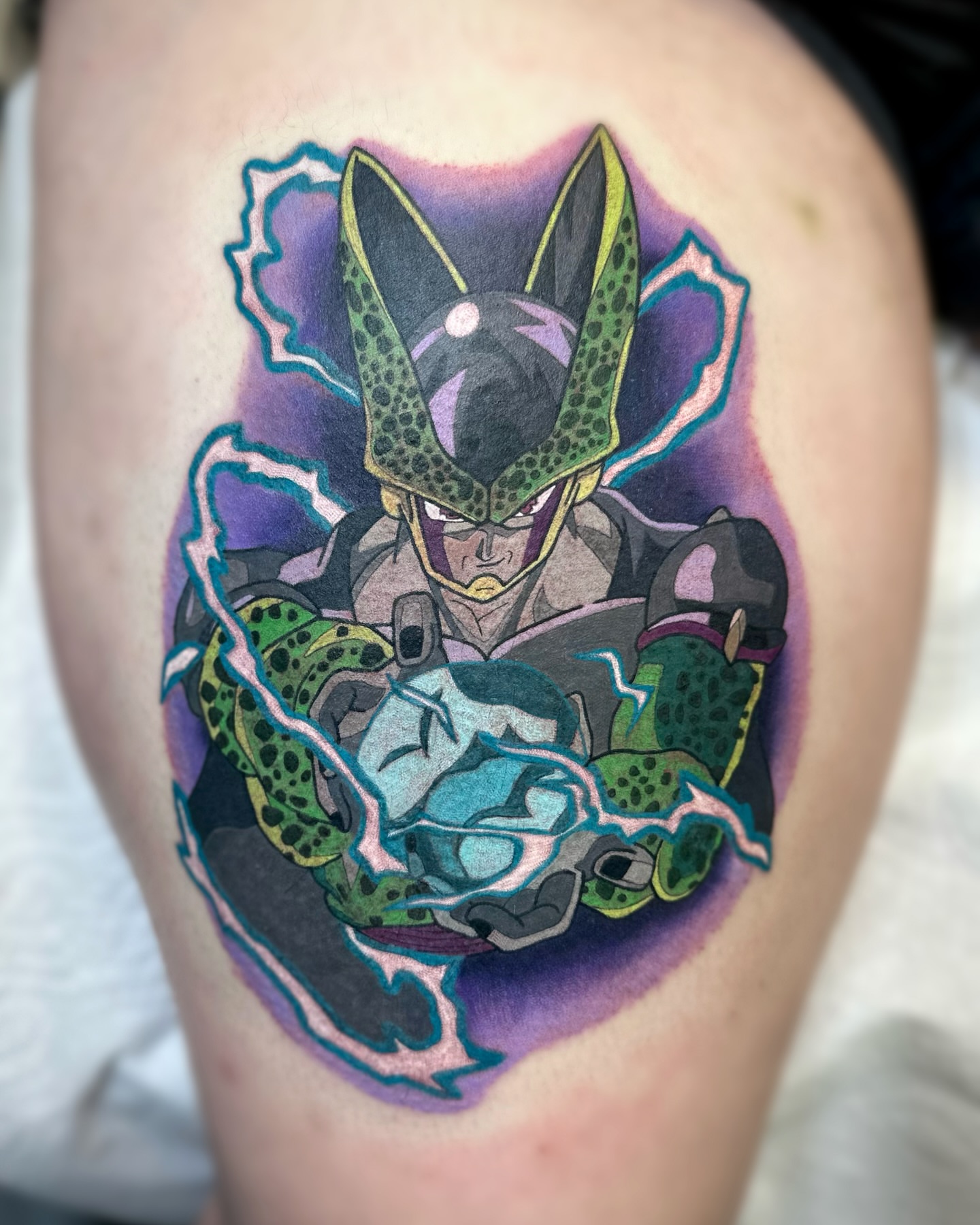 Cell from Dragon Ball Z anime tattoo on the thigh by Savannah Compton
