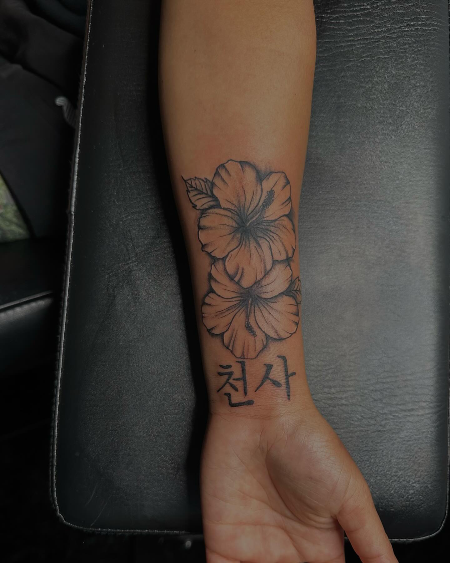 Hibiscus flowers black and grey tattoo on the forearm by Bay Area Tattoo Artist ✍🏽