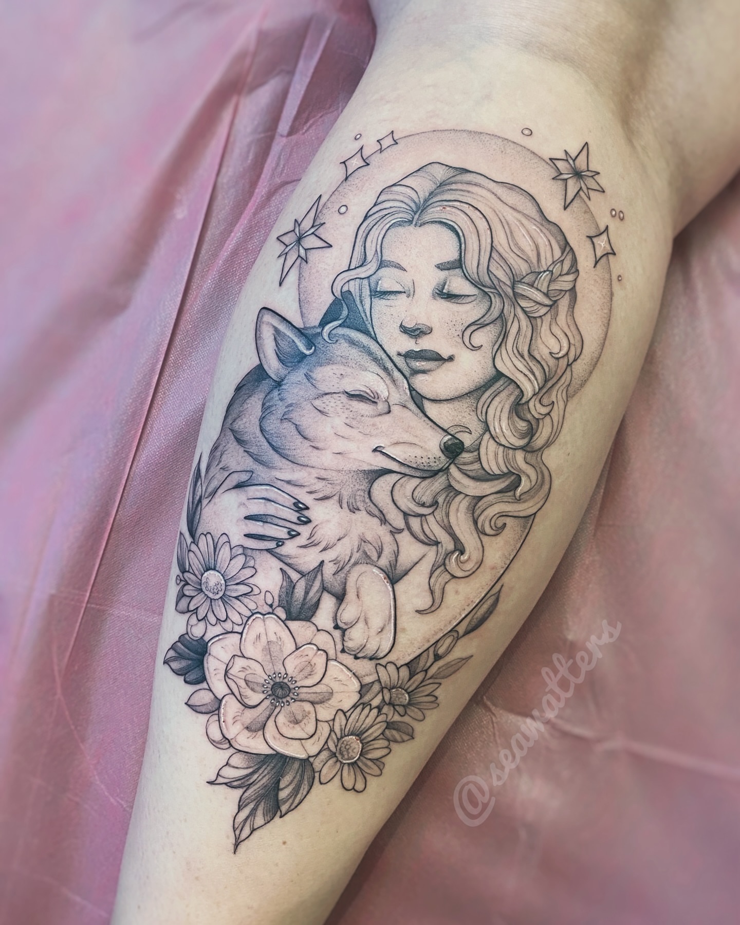 Woman and wolf dotwork tattoo on the thigh by Caitlin Watters
