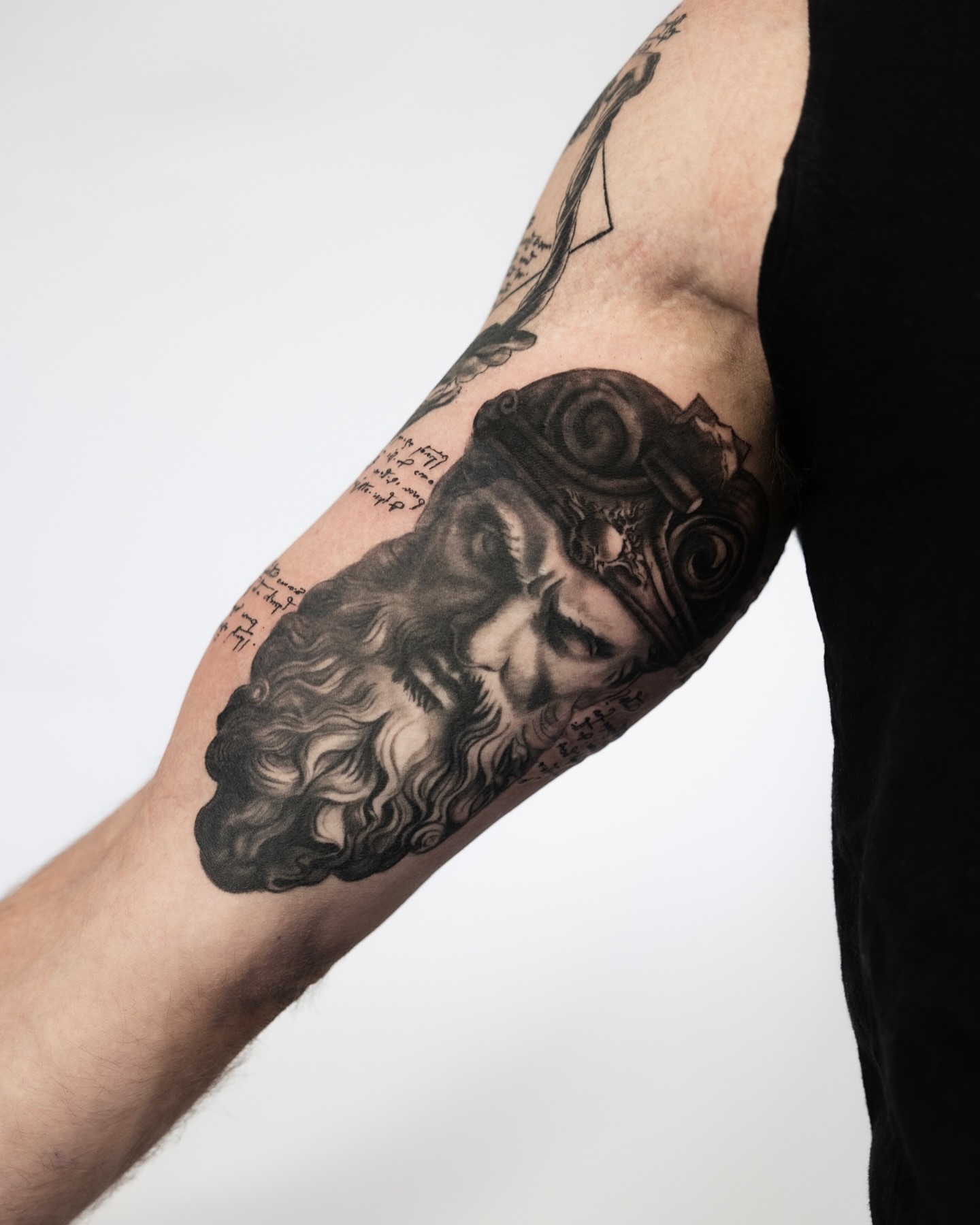 Bearded man with aviator goggles realism tattoo on the forearm by Ben Cisek