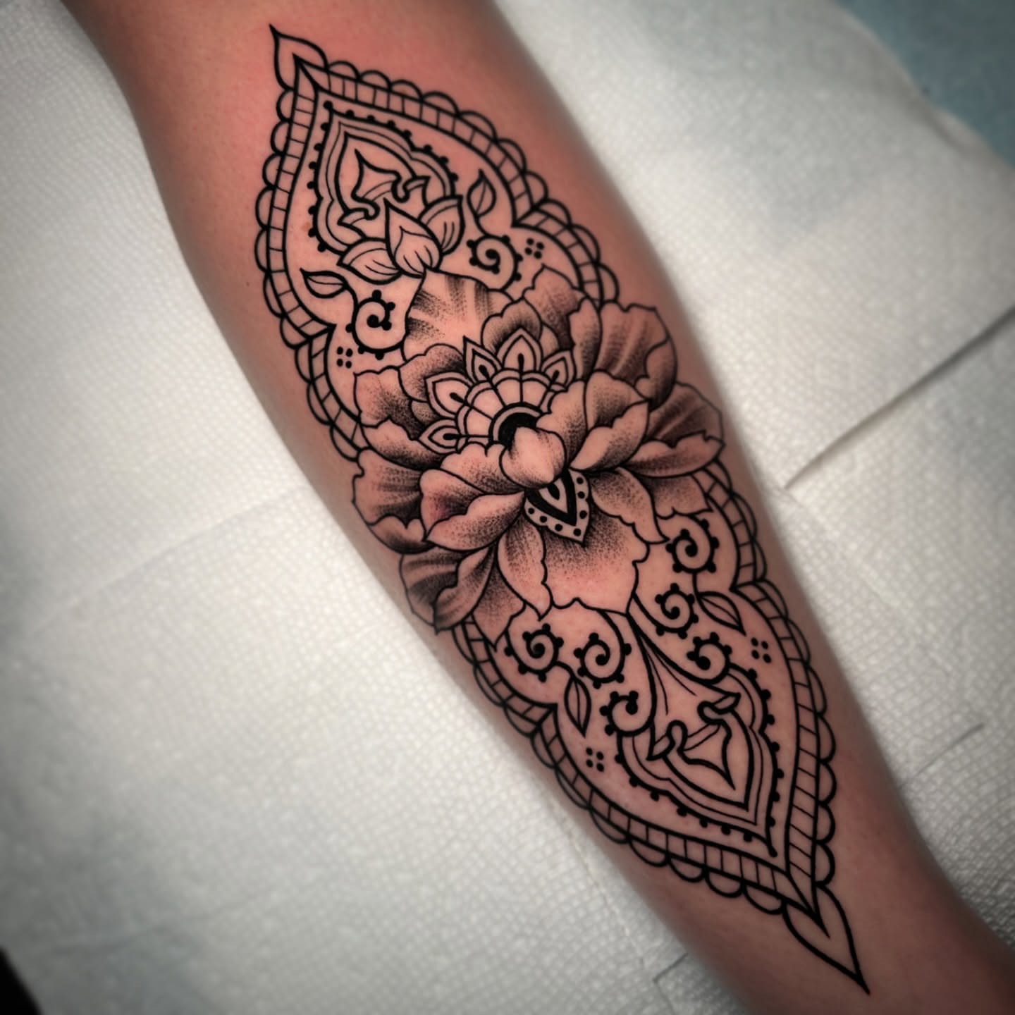 Floral design ornamental tattoo on the forearm by Lisa Nikolopoulos, New York, New York
