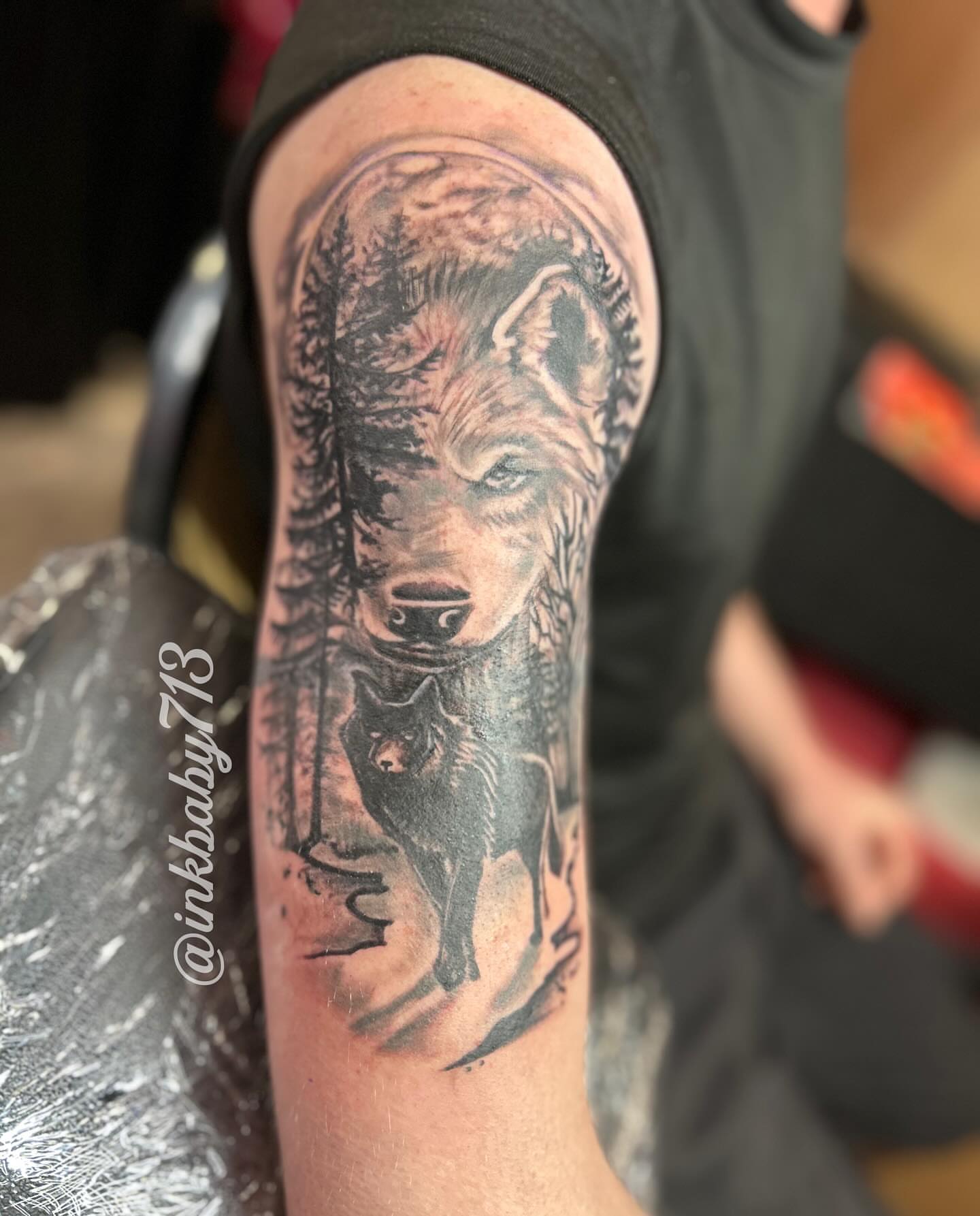Wolf realism tattoo on the forearm by Ayanna Luna