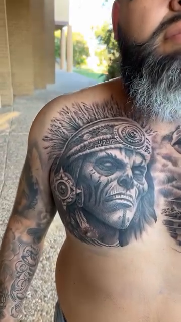 Aztec warrior and serpent realism tattoo by Brian Hernandez