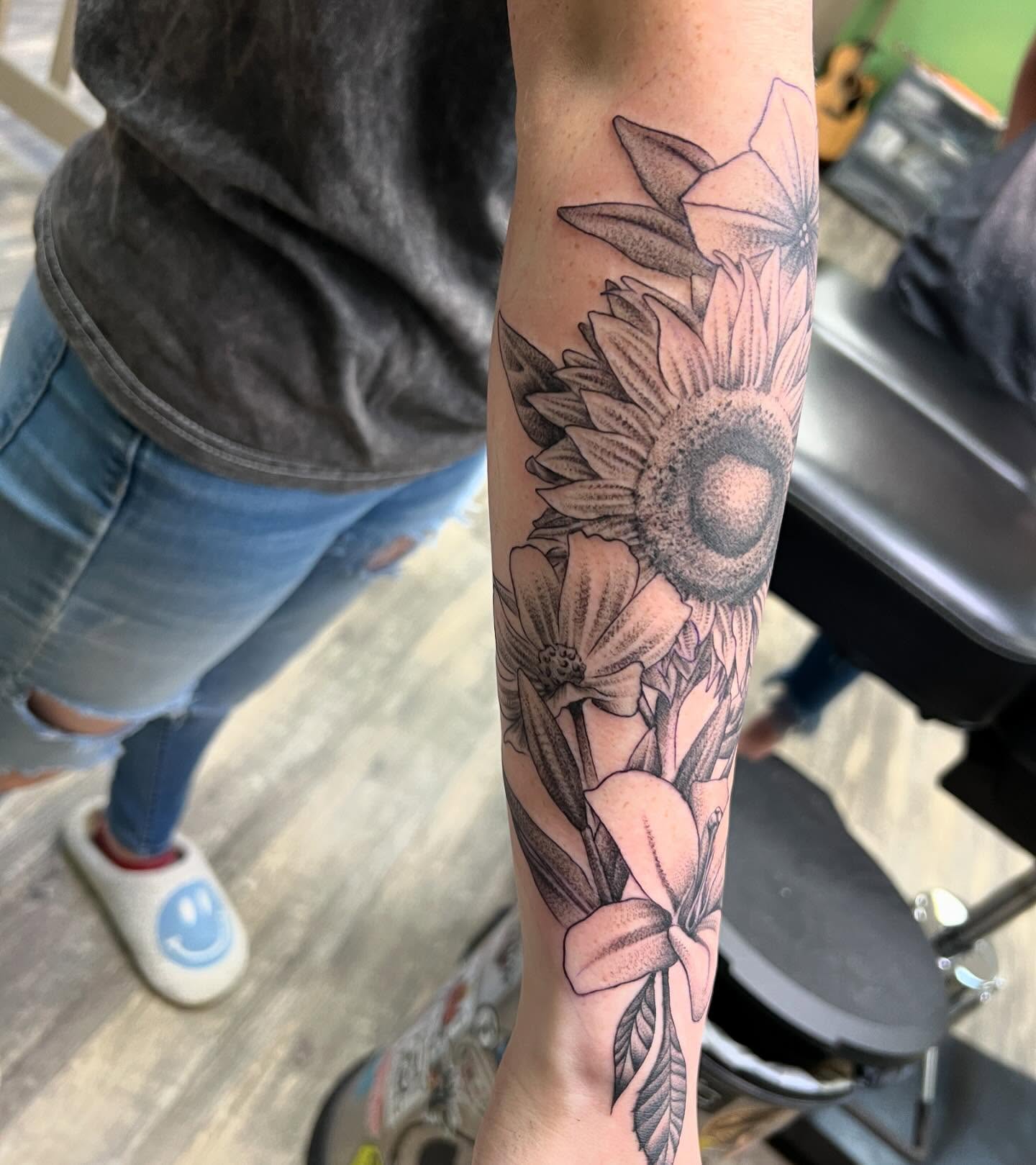 Sunflower and flowers black and grey tattoo on the forearm by Dustin Quillen Tattoo Artist, Campbellsville, Kentucky