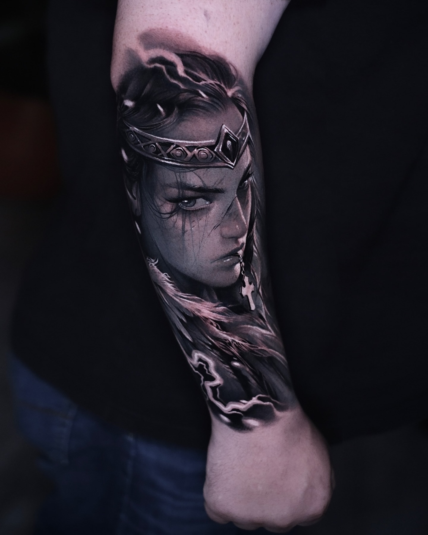 Woman with crown realism tattoo on the forearm by Anton Martiushev