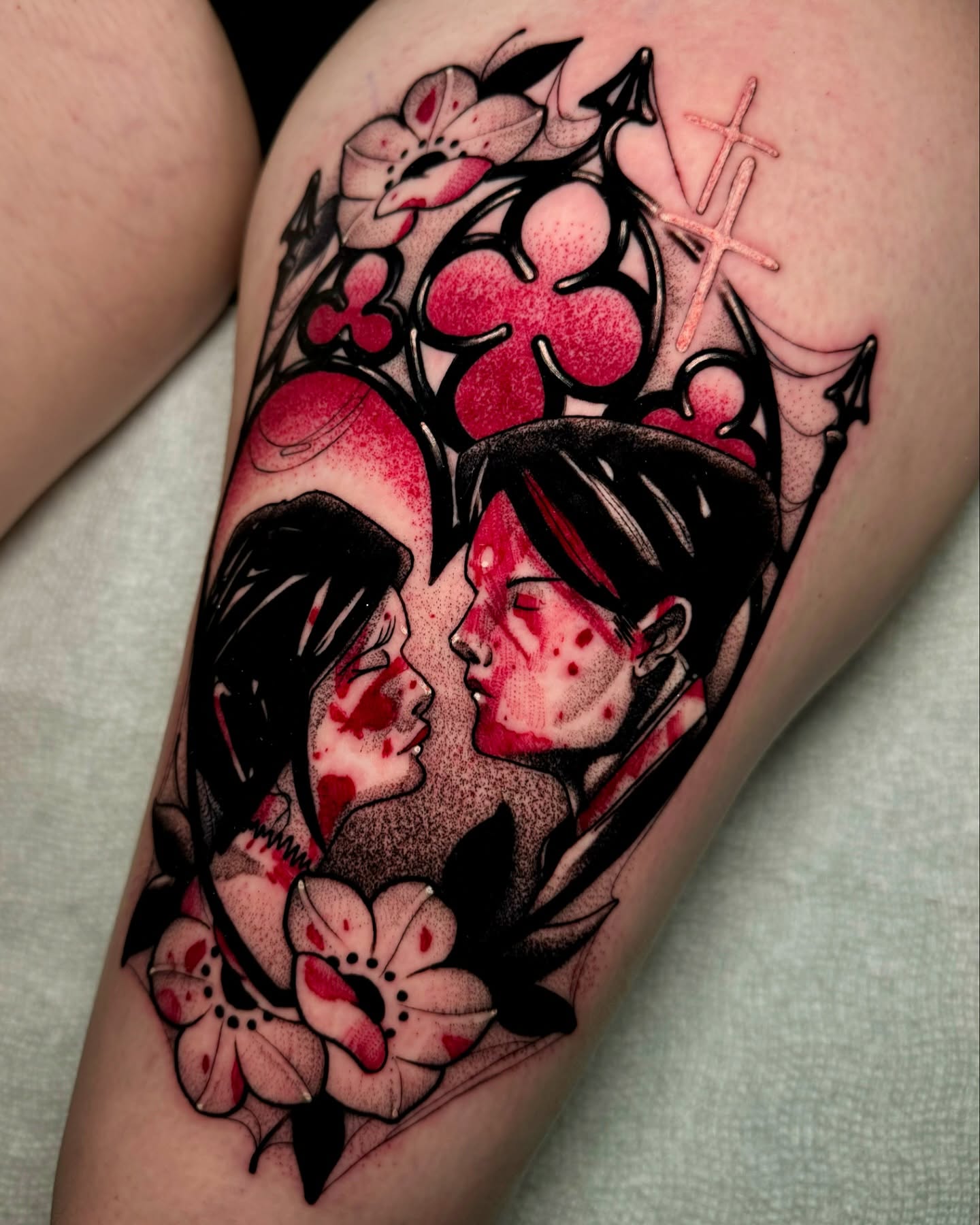 Couple kissing dotwork tattoo on the thigh by Robert Graye