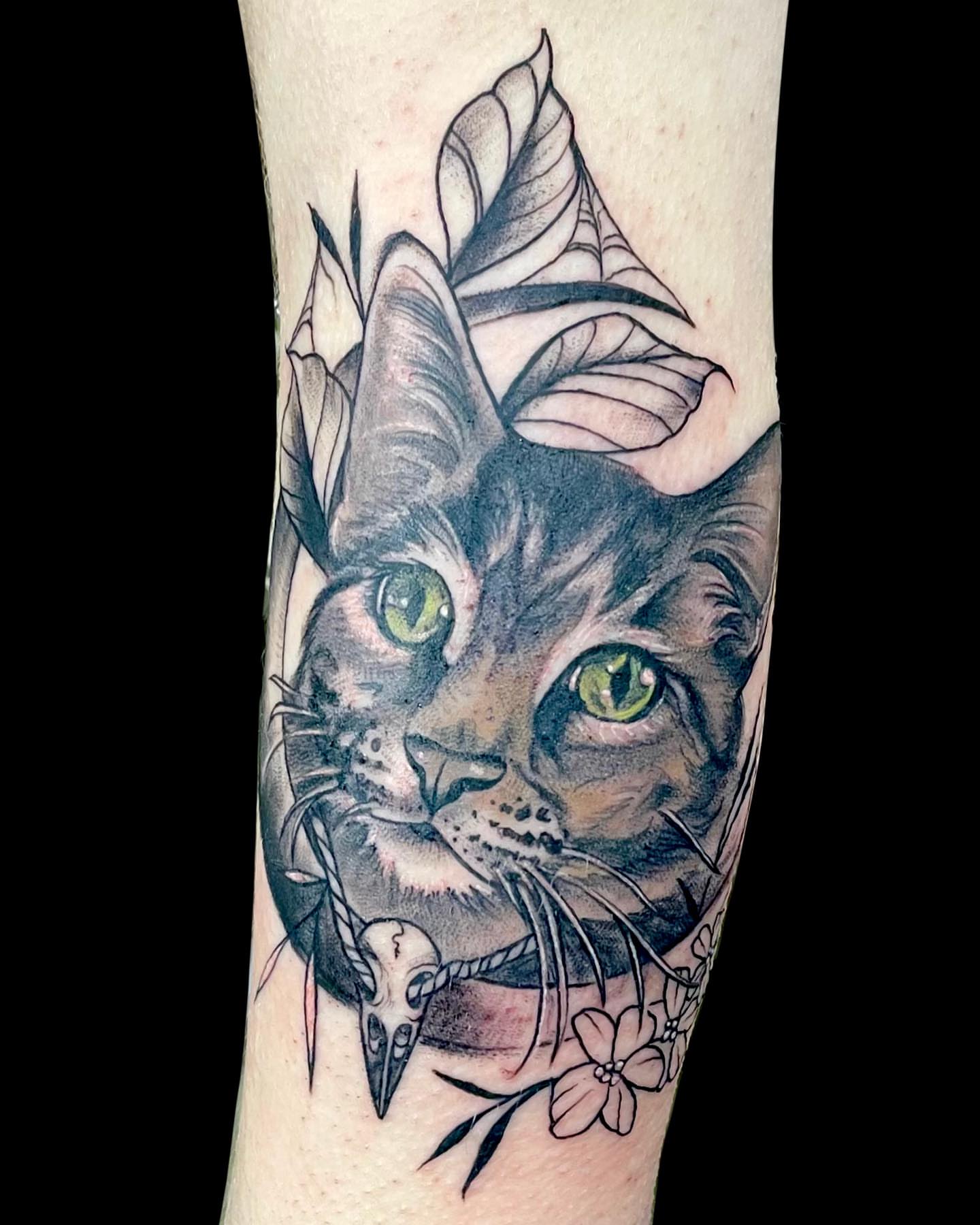 Cat realism tattoo on the forearm by Antoinette