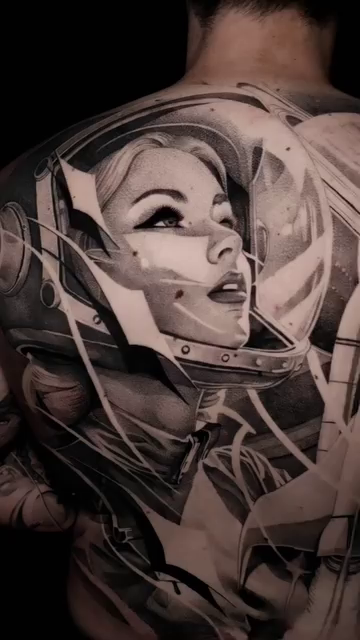 Woman in astronaut helmet realism tattoo by Ana Fajardo