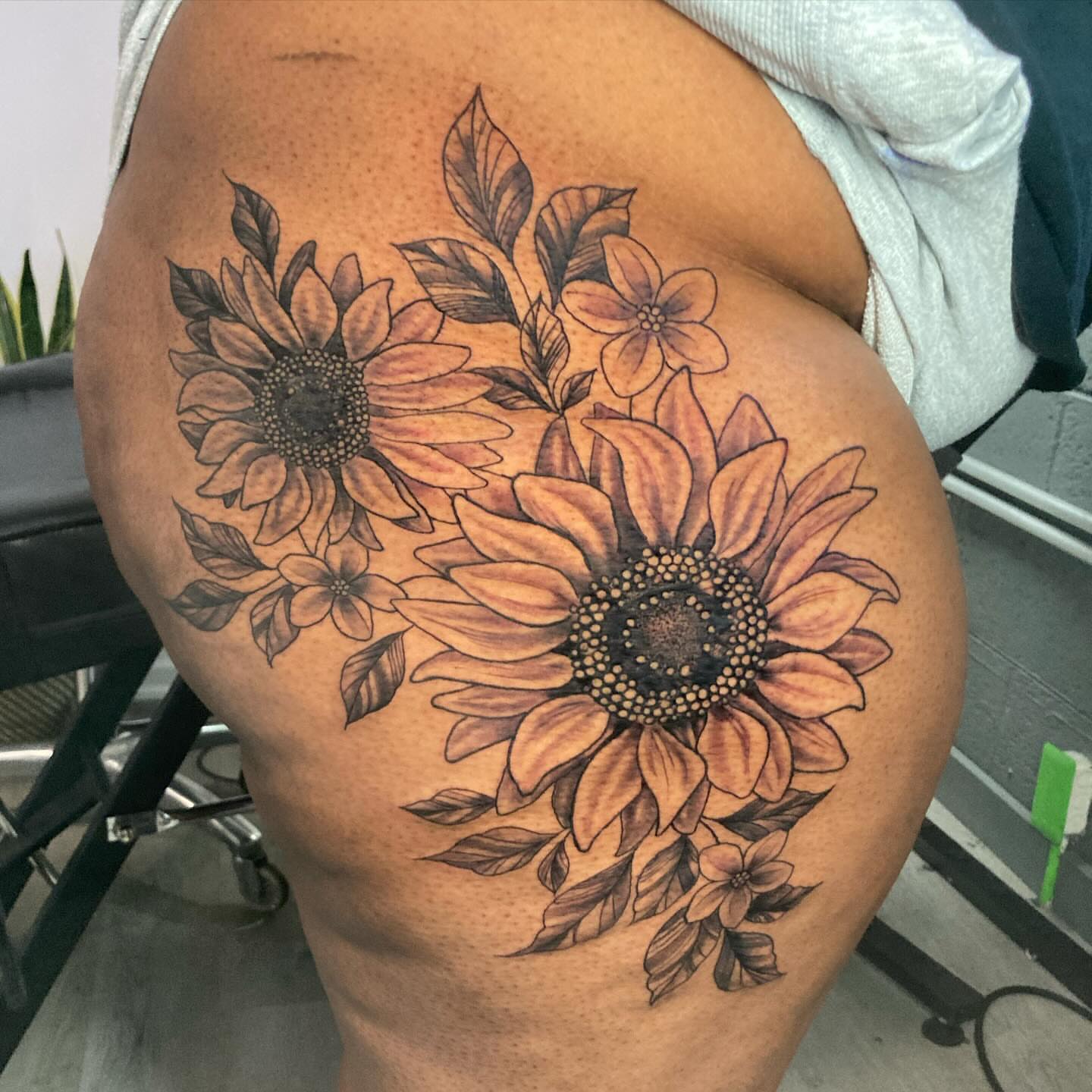 Sunflower black and grey tattoo on the shoulder by Detroit Tattoo Artist