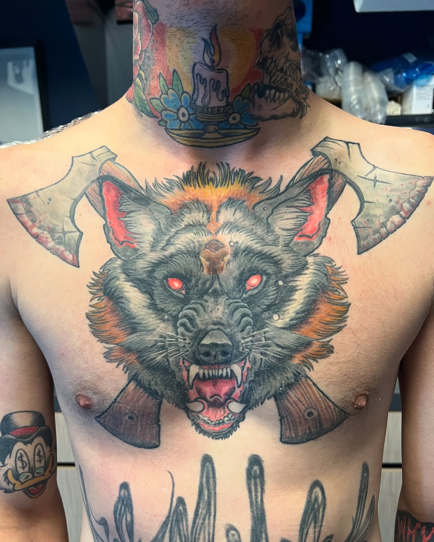 Wolf head American traditional tattoo on the chest by Vincent C DiBiaso, Covington, Kentucky