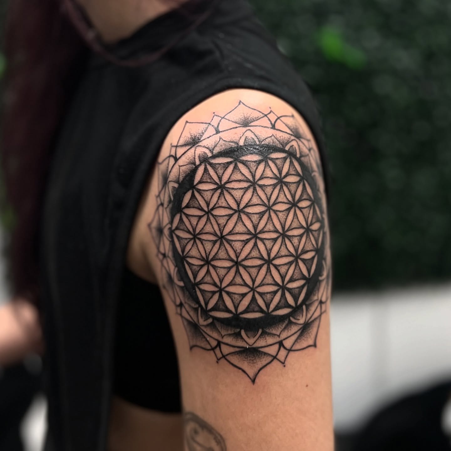 Flower of life geometric tattoo on the shoulder by Syd Cheyenne