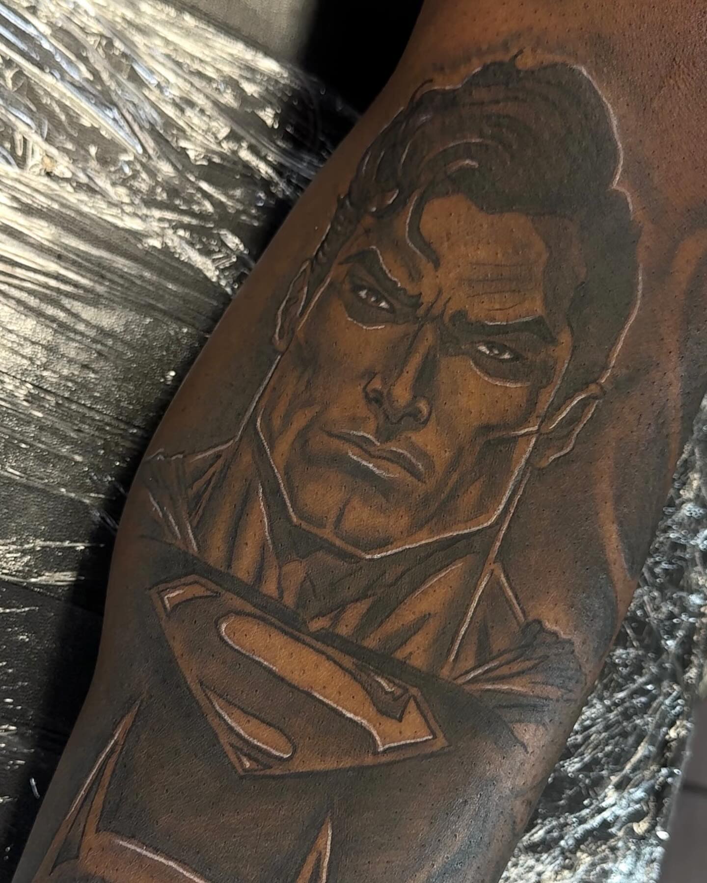 Superman black and grey tattoo on the forearm by Tatt2T (T King)