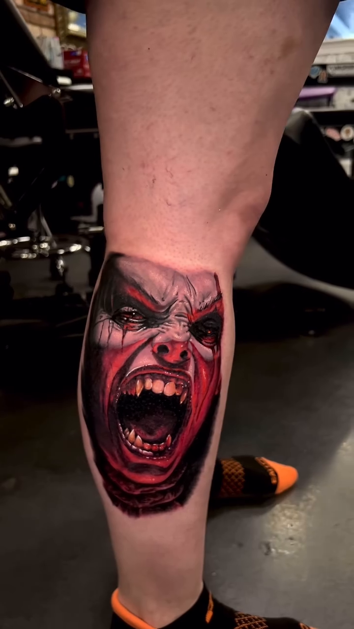 Screaming clown face realism tattoo by Matthew Diaz
